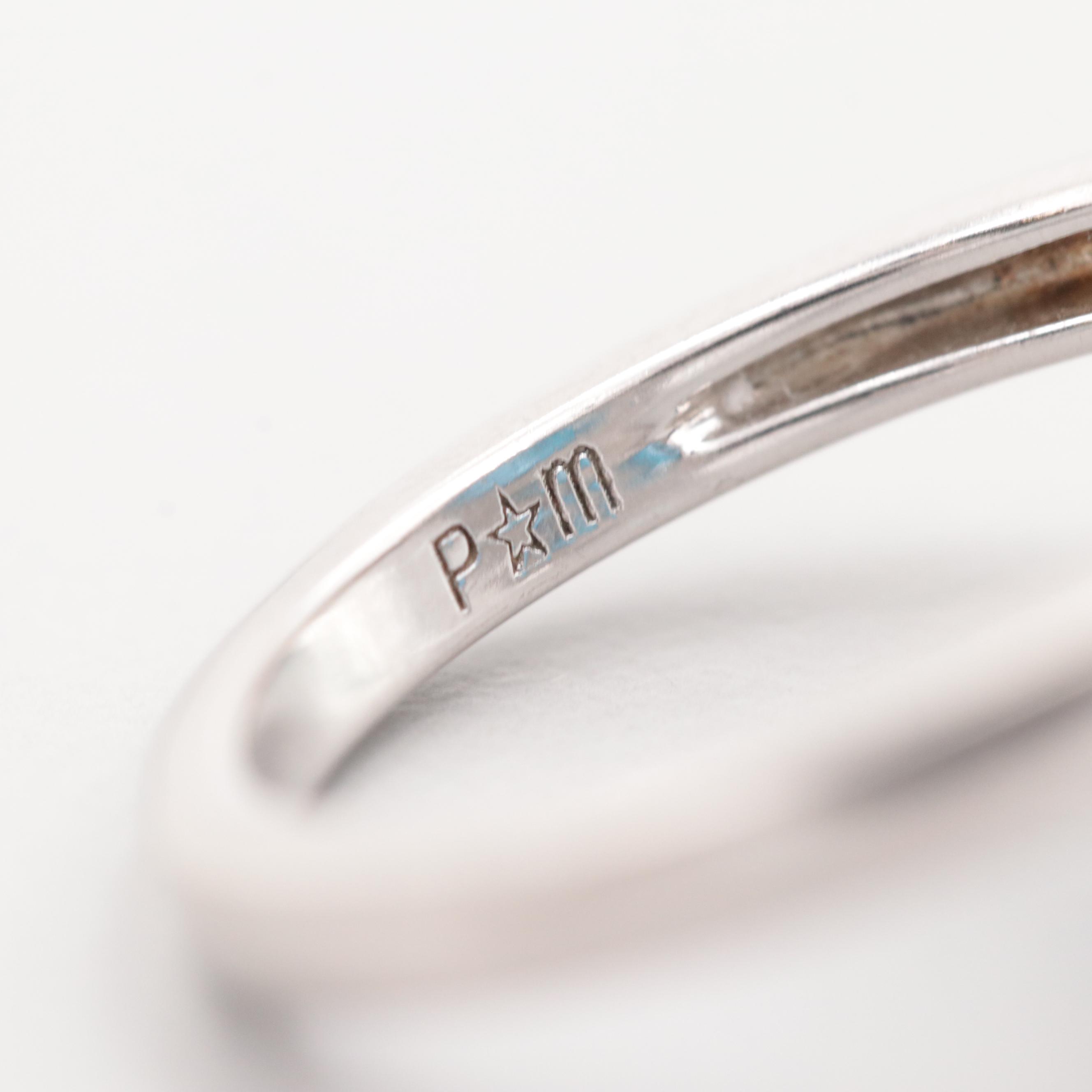 Sterling Silver Blue Topaz and Synthetic White Sapphire Ring