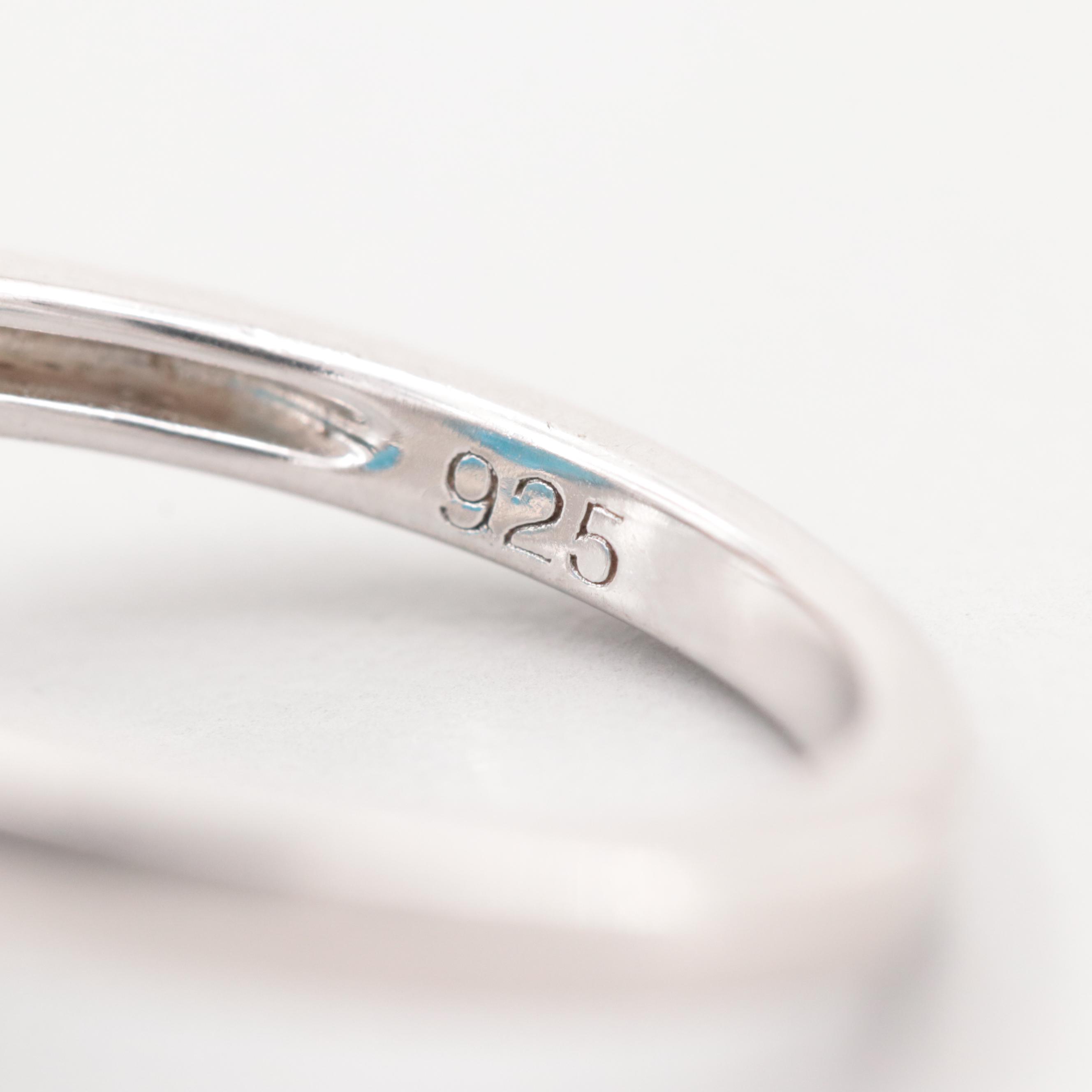 Sterling Silver Blue Topaz and Synthetic White Sapphire Ring