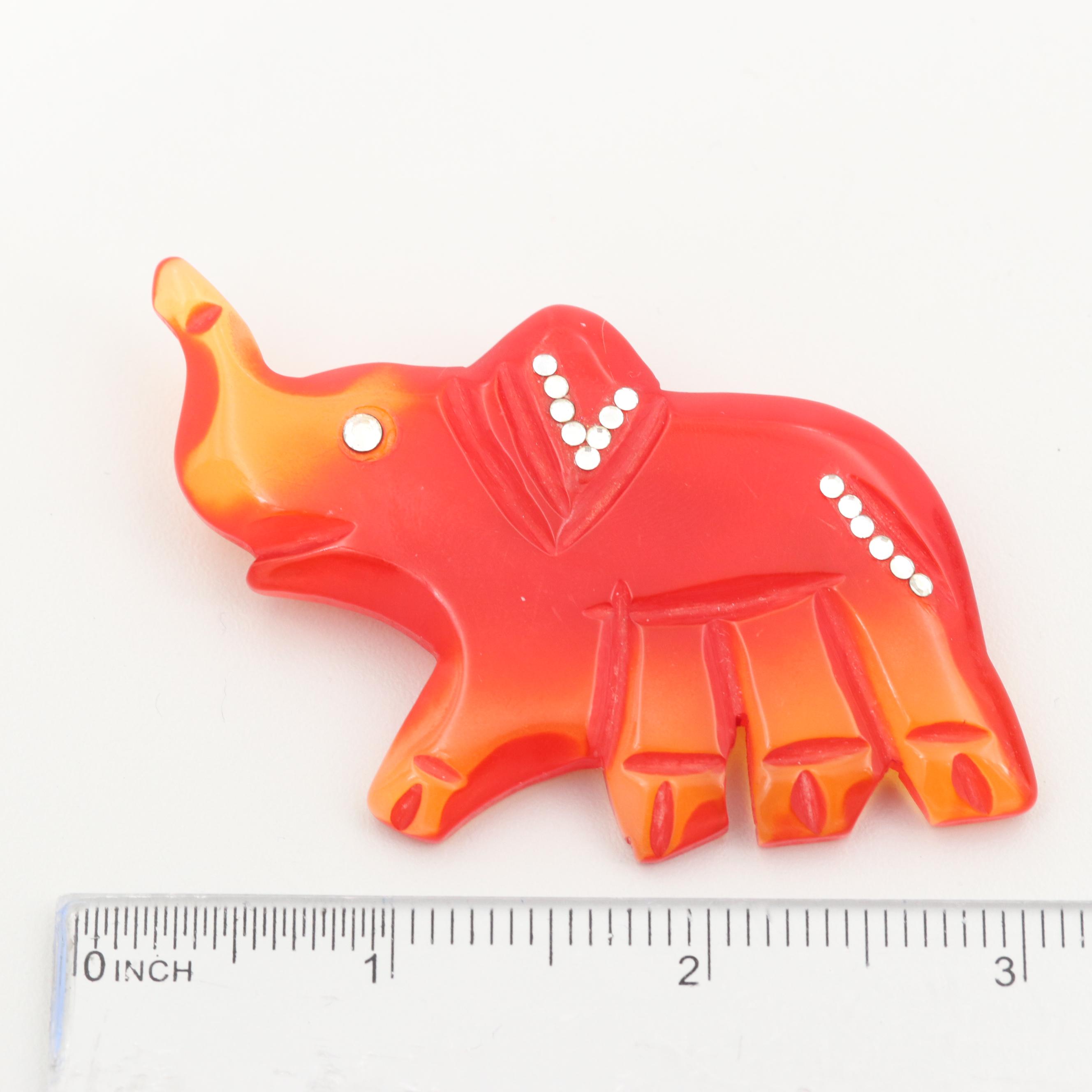 Vintage Gold Tone Glass and Tomato Bakelite Carved Elephant Brooch
