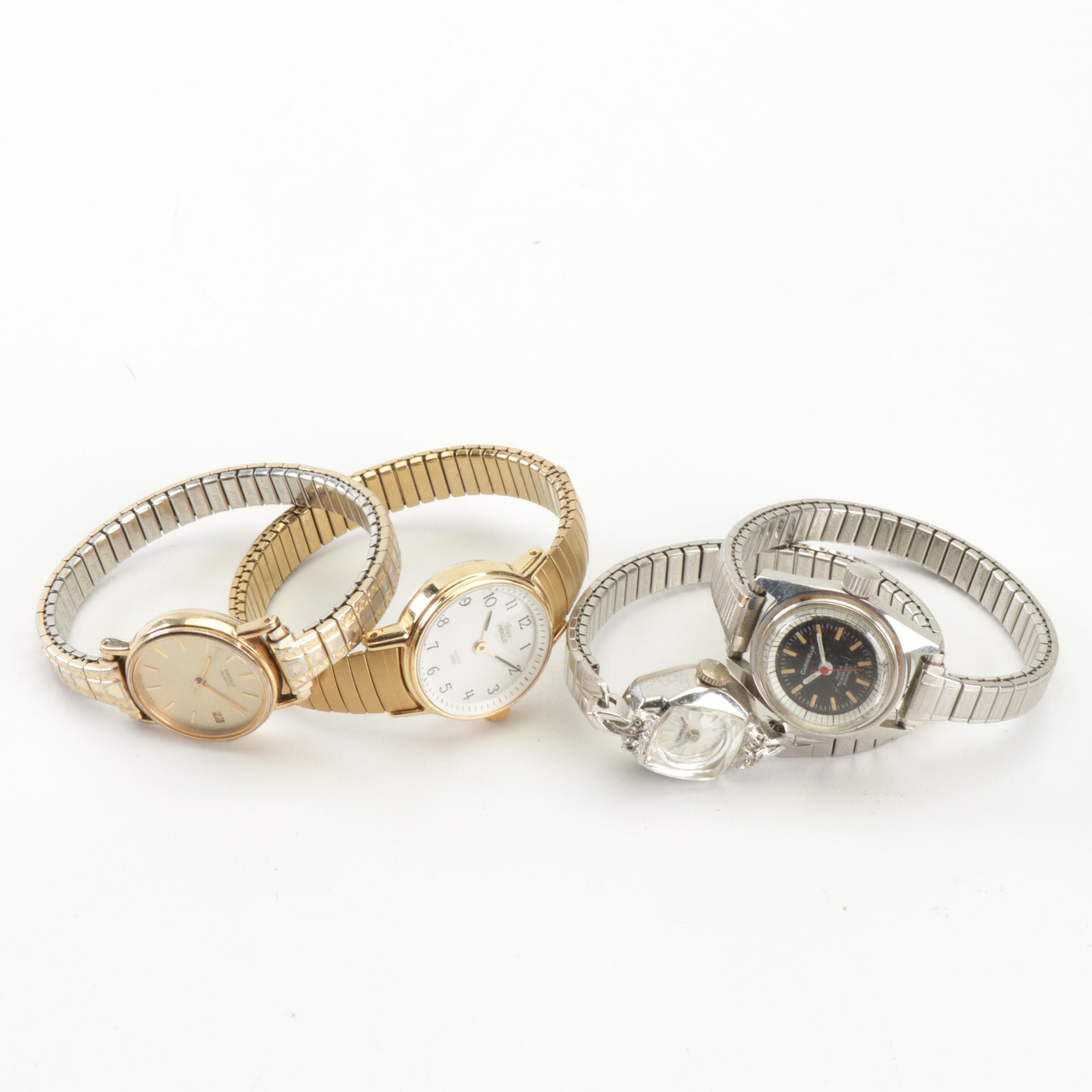 Silver and Gold Tone Wrist Watches Featuring Tempus and Timex