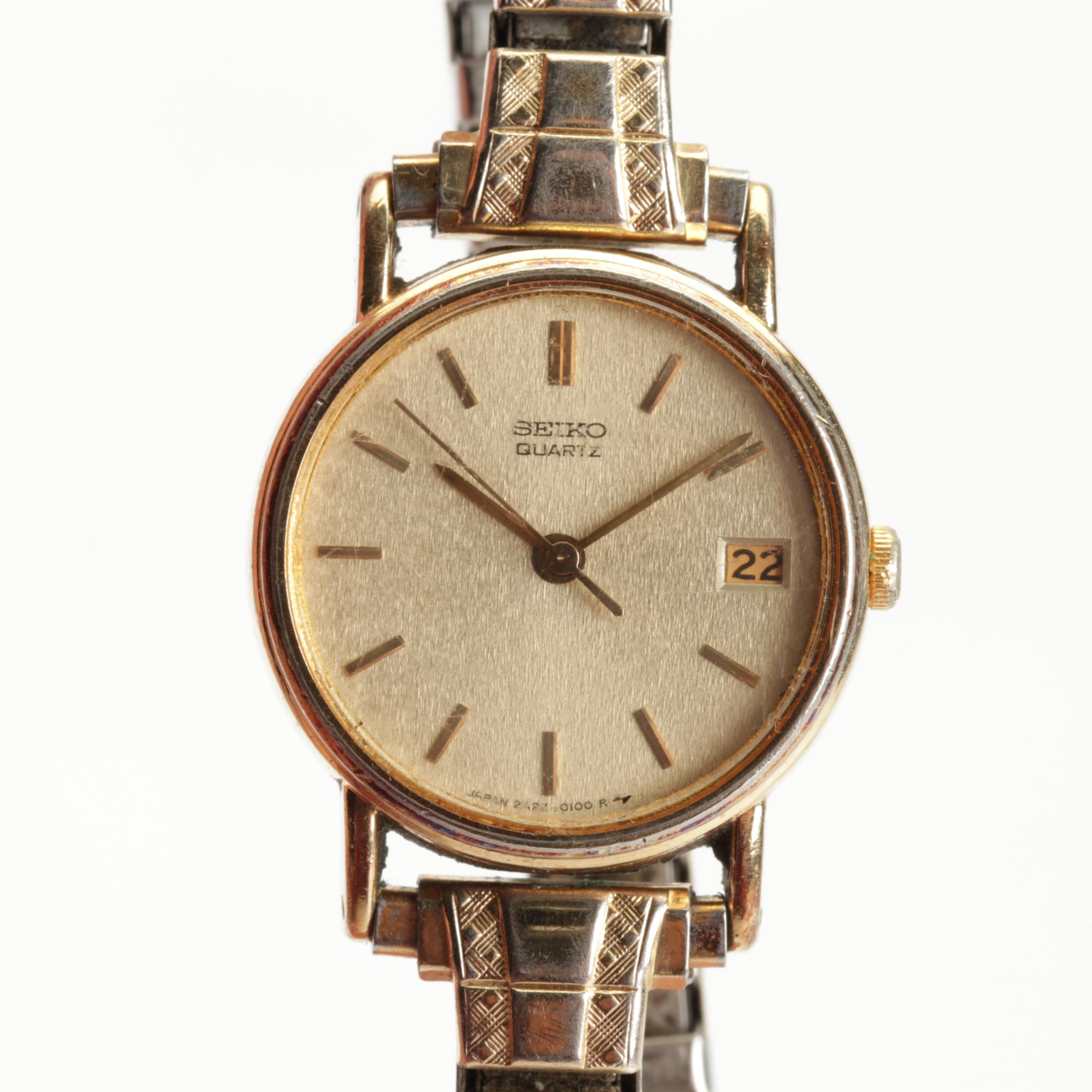 Silver and Gold Tone Wrist Watches Featuring Tempus and Timex