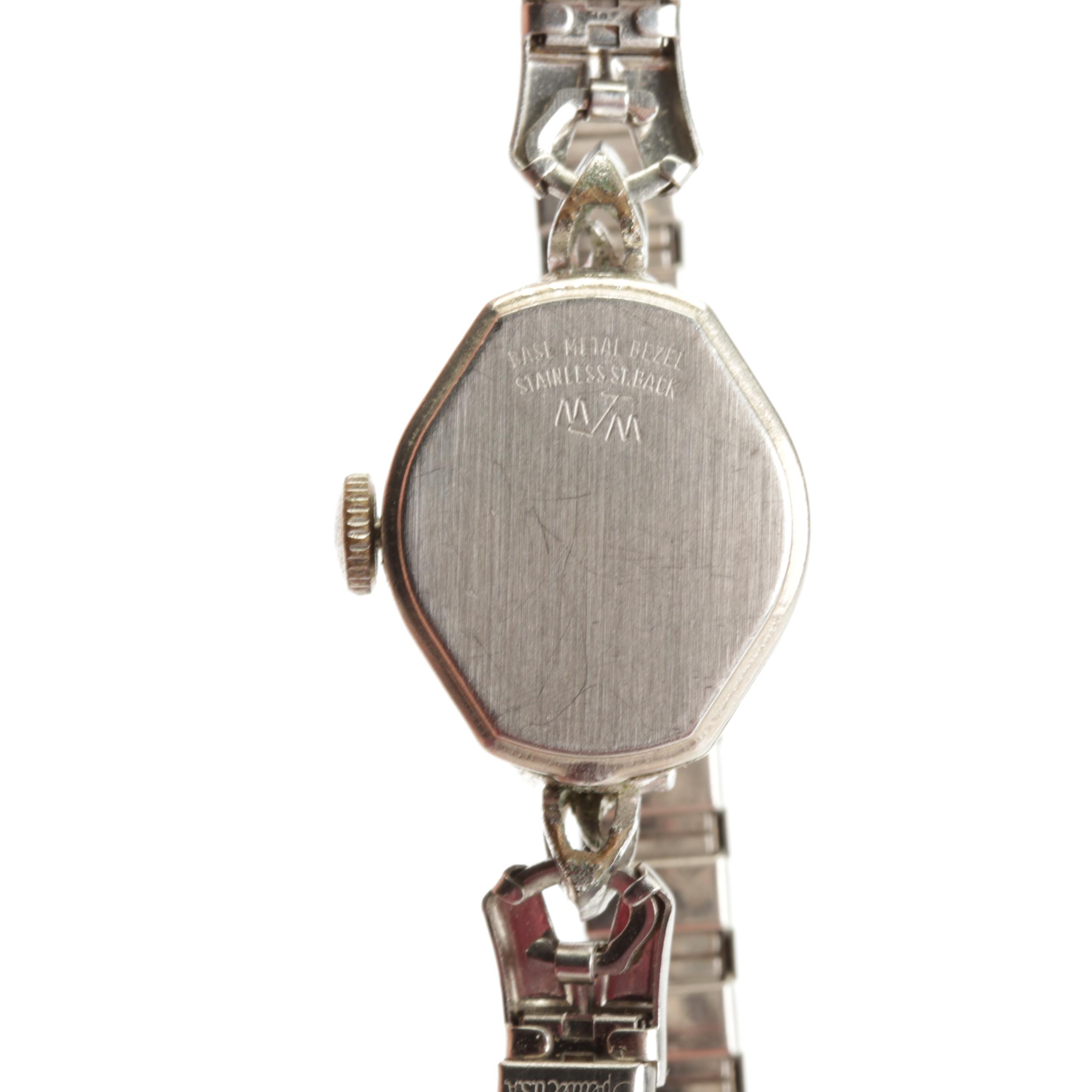 Silver and Gold Tone Wrist Watches Featuring Tempus and Timex