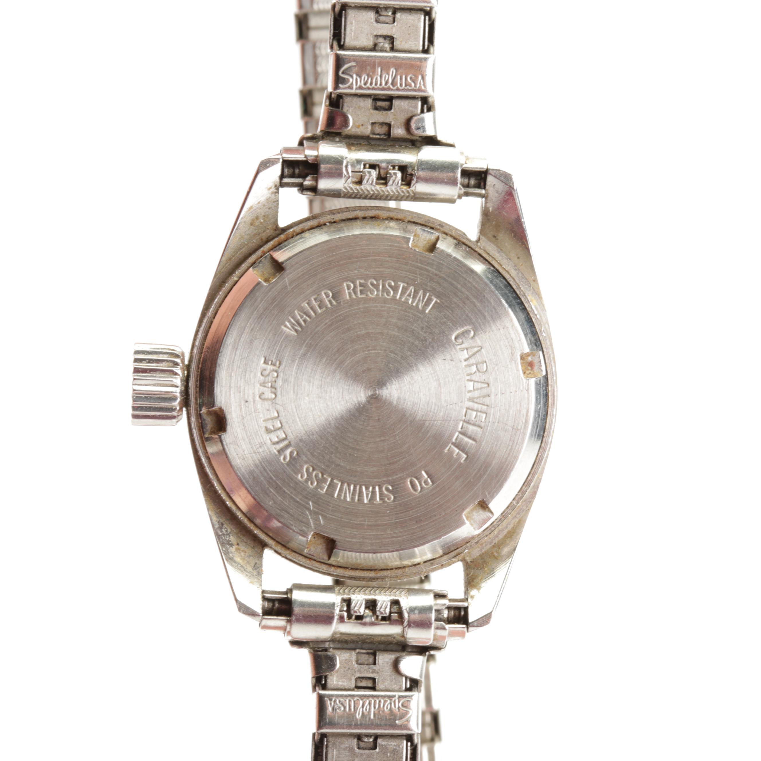 Silver and Gold Tone Wrist Watches Featuring Tempus and Timex