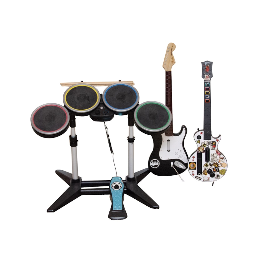 Nintendo Wii Drum Set and Guitars Including Rockband and Guitar Hero
