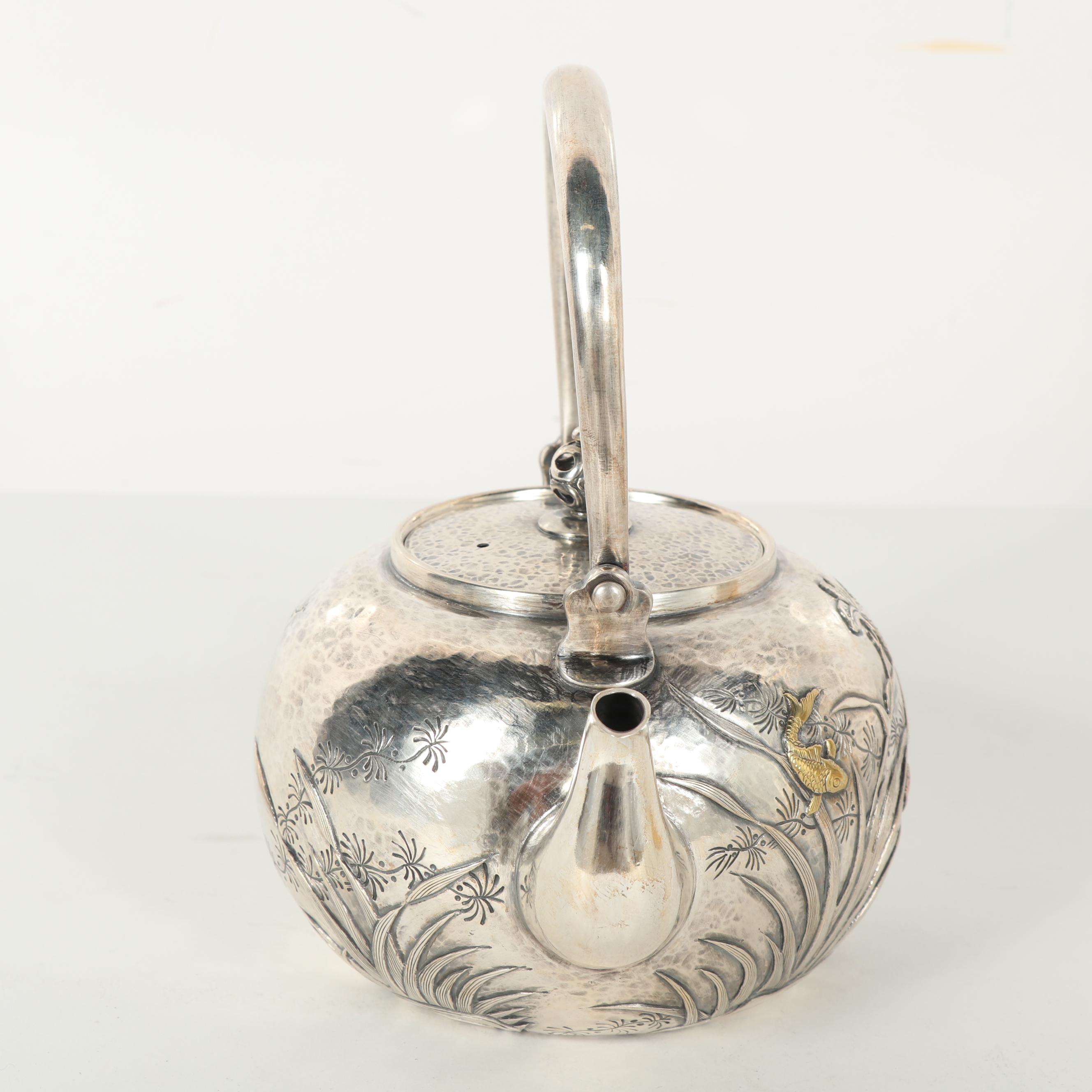Japanese Sanju Saku Sterling Silver and Mixed Metal Repoussé Teapot, Meiji