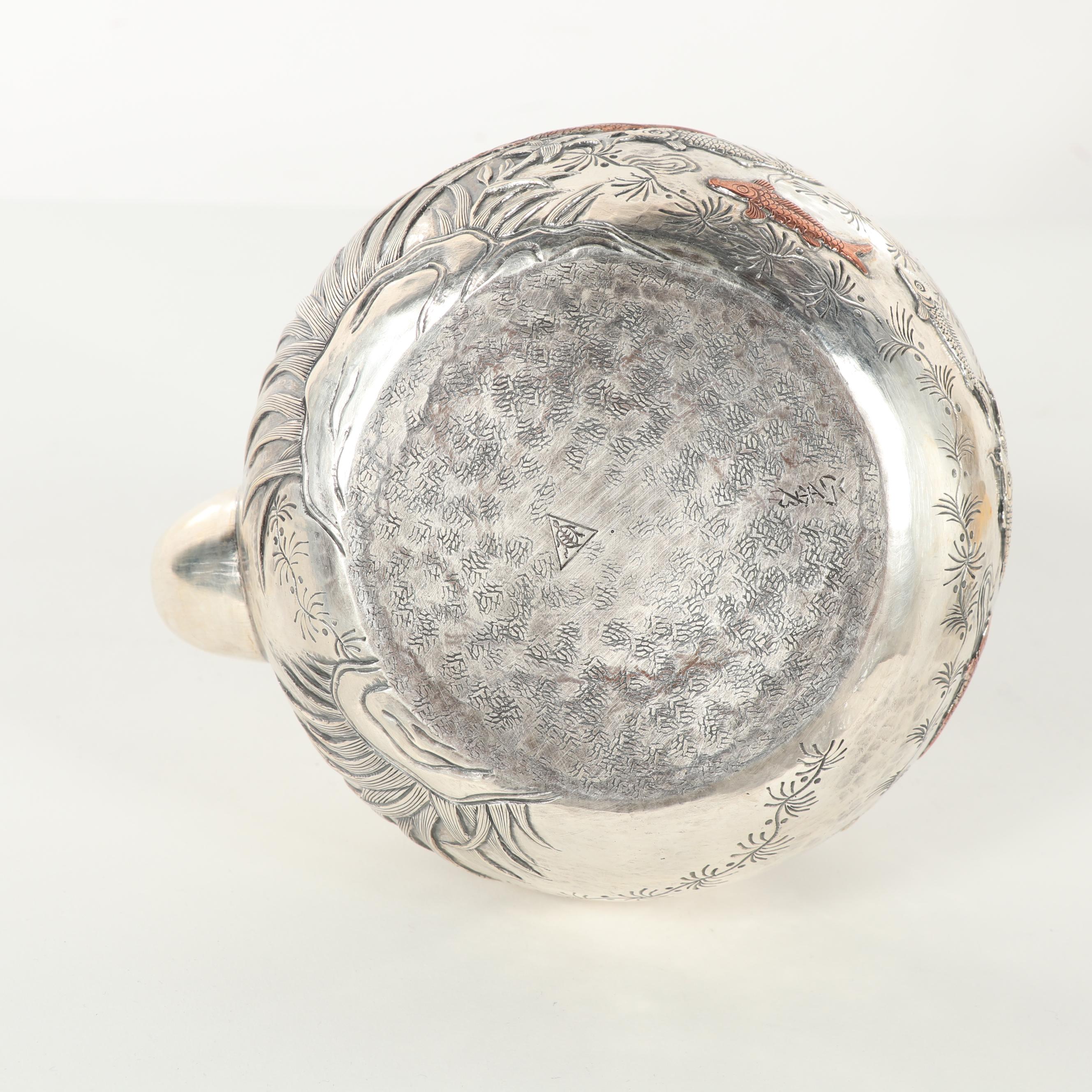 Japanese Sanju Saku Sterling Silver and Mixed Metal Repoussé Teapot, Meiji