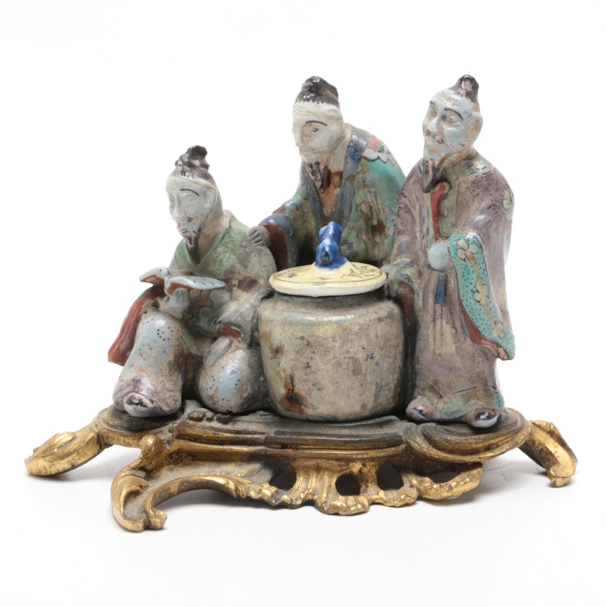 Chinese Ceramic Figurine with Brass Stand