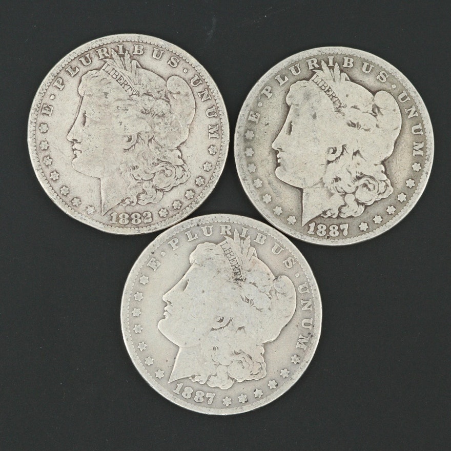 One 1882 and Two 1887-O Morgan Silver Dollars