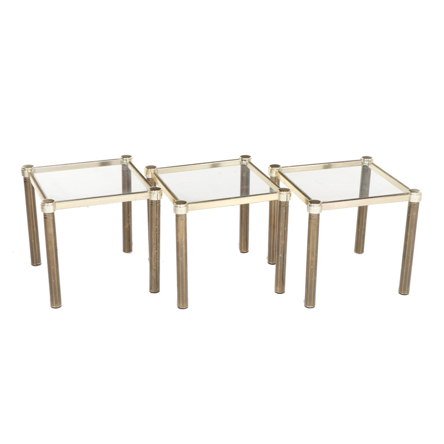 Three Contemporary Gold and Brass Tone Glass Top Side Tables