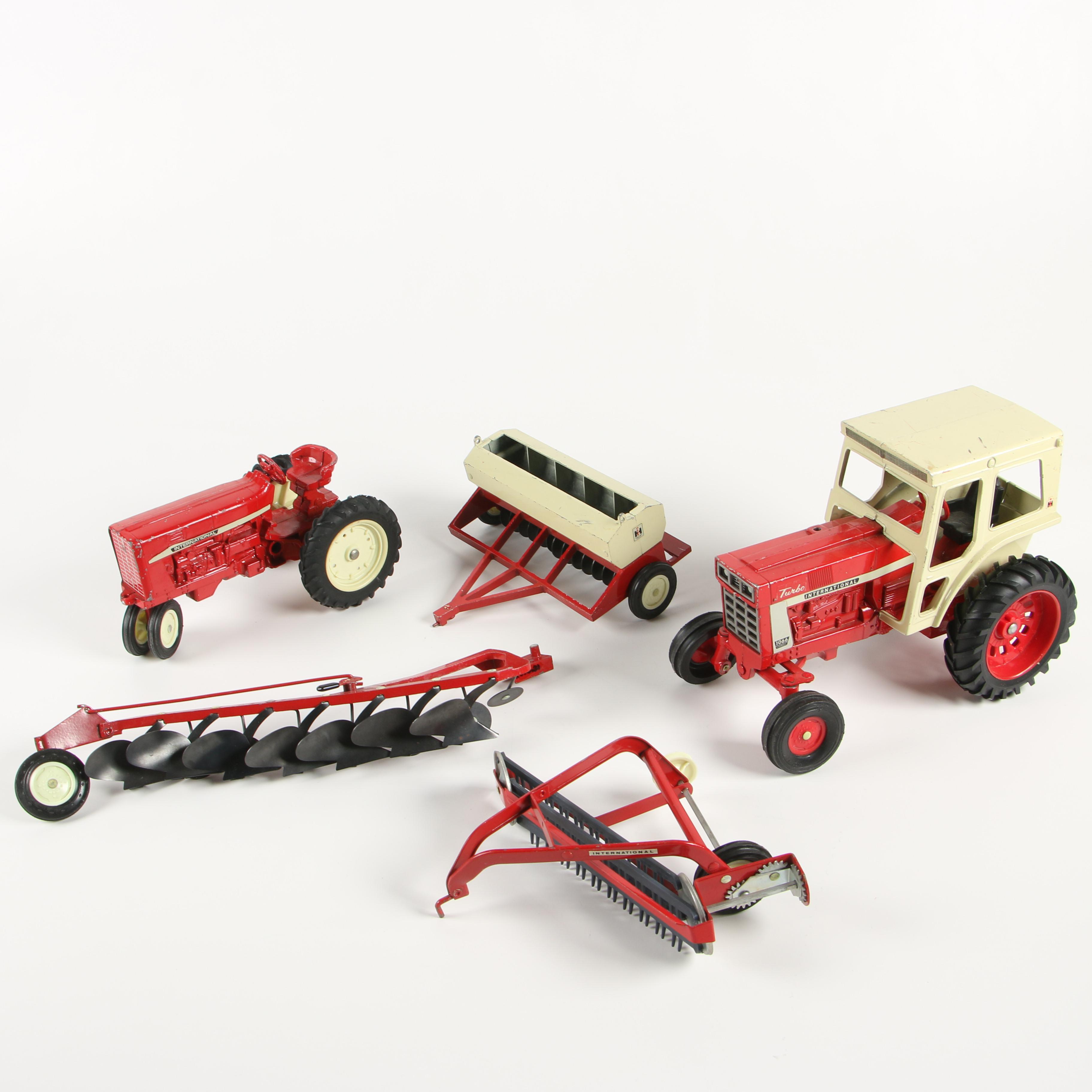 ERTL Co. Die-Cast Metal International Harvester Toy Tractors and Farm Implements