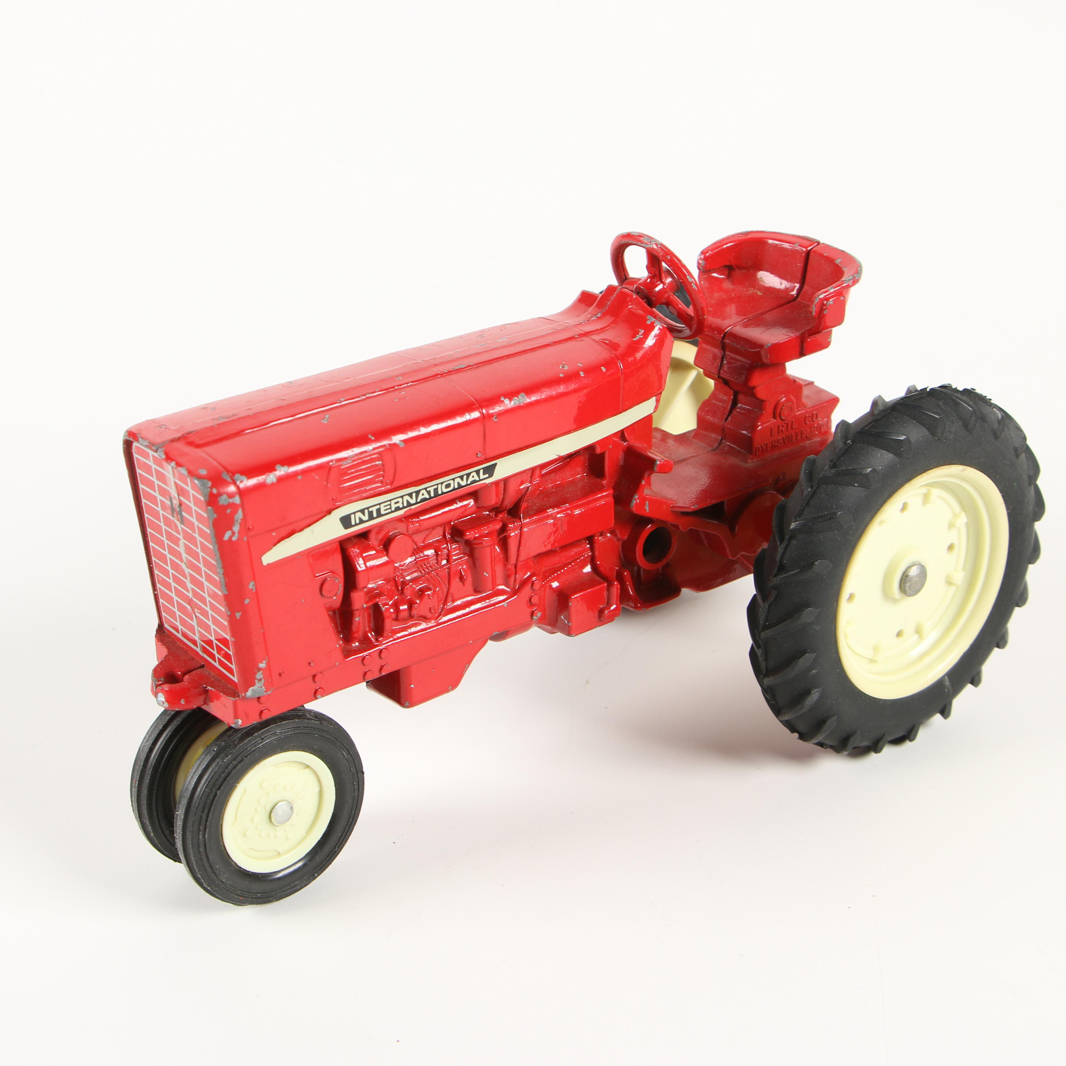 ERTL Co. Die-Cast Metal International Harvester Toy Tractors and Farm Implements