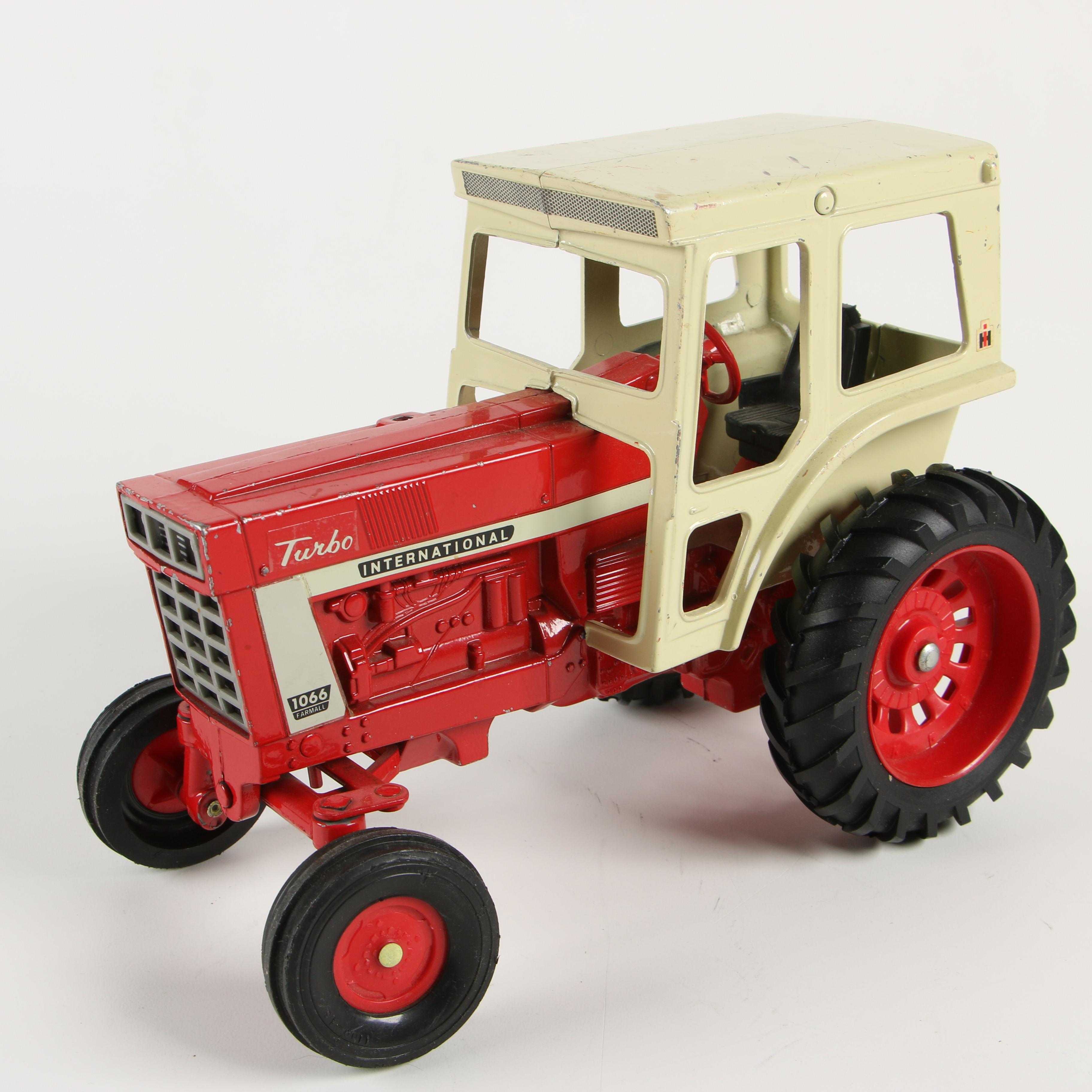 ERTL Co. Die-Cast Metal International Harvester Toy Tractors and Farm Implements