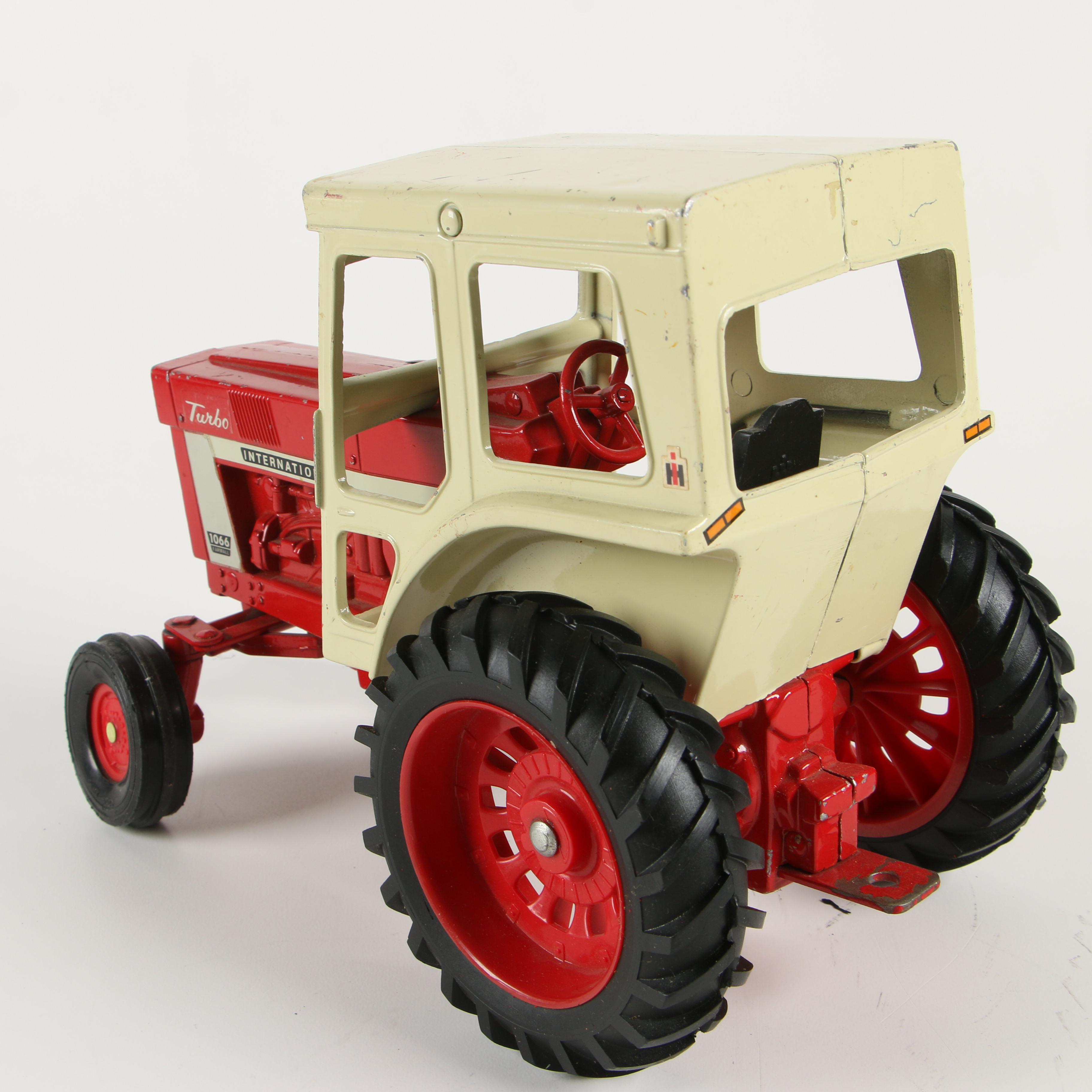 ERTL Co. Die-Cast Metal International Harvester Toy Tractors and Farm Implements