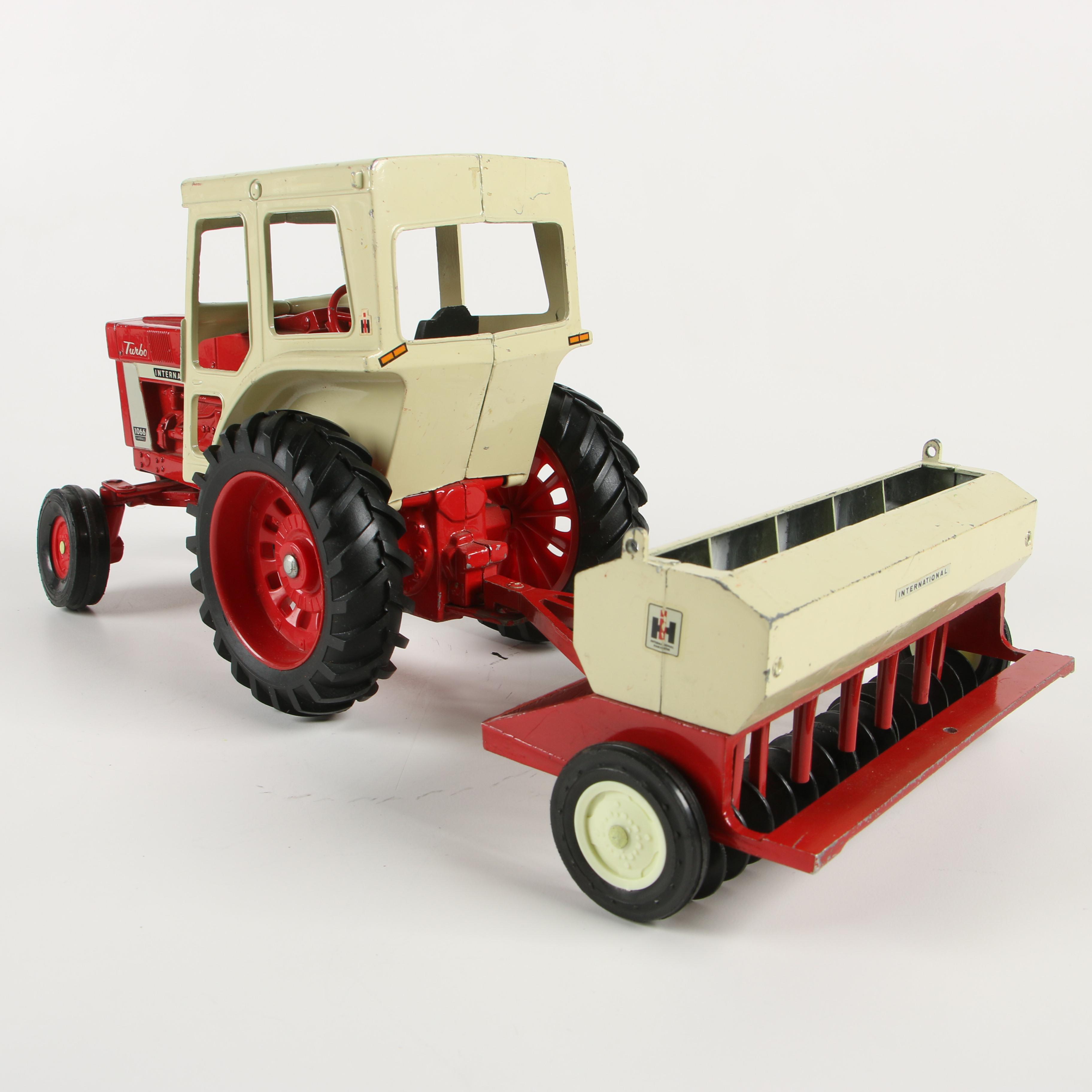 ERTL Co. Die-Cast Metal International Harvester Toy Tractors and Farm Implements