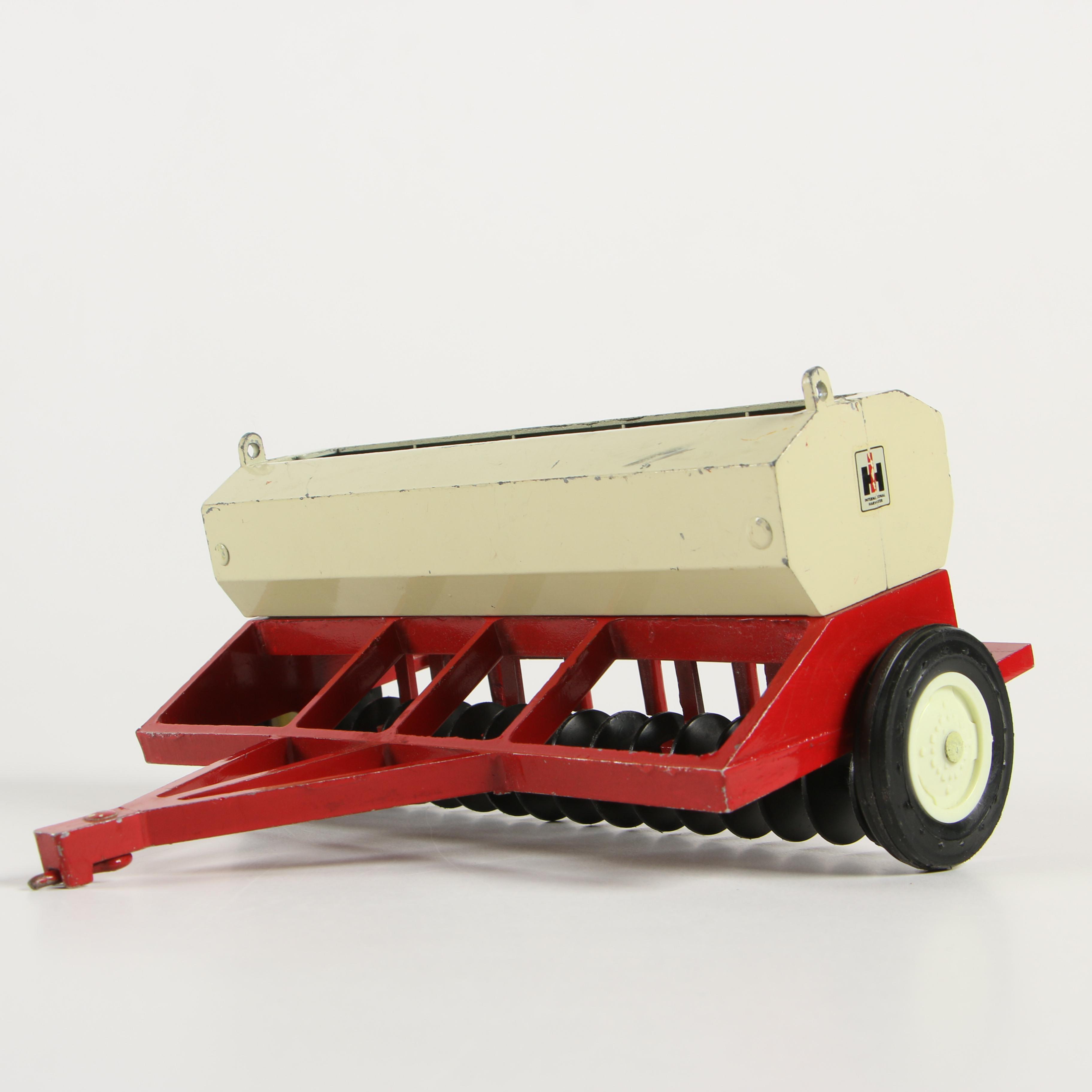 ERTL Co. Die-Cast Metal International Harvester Toy Tractors and Farm Implements