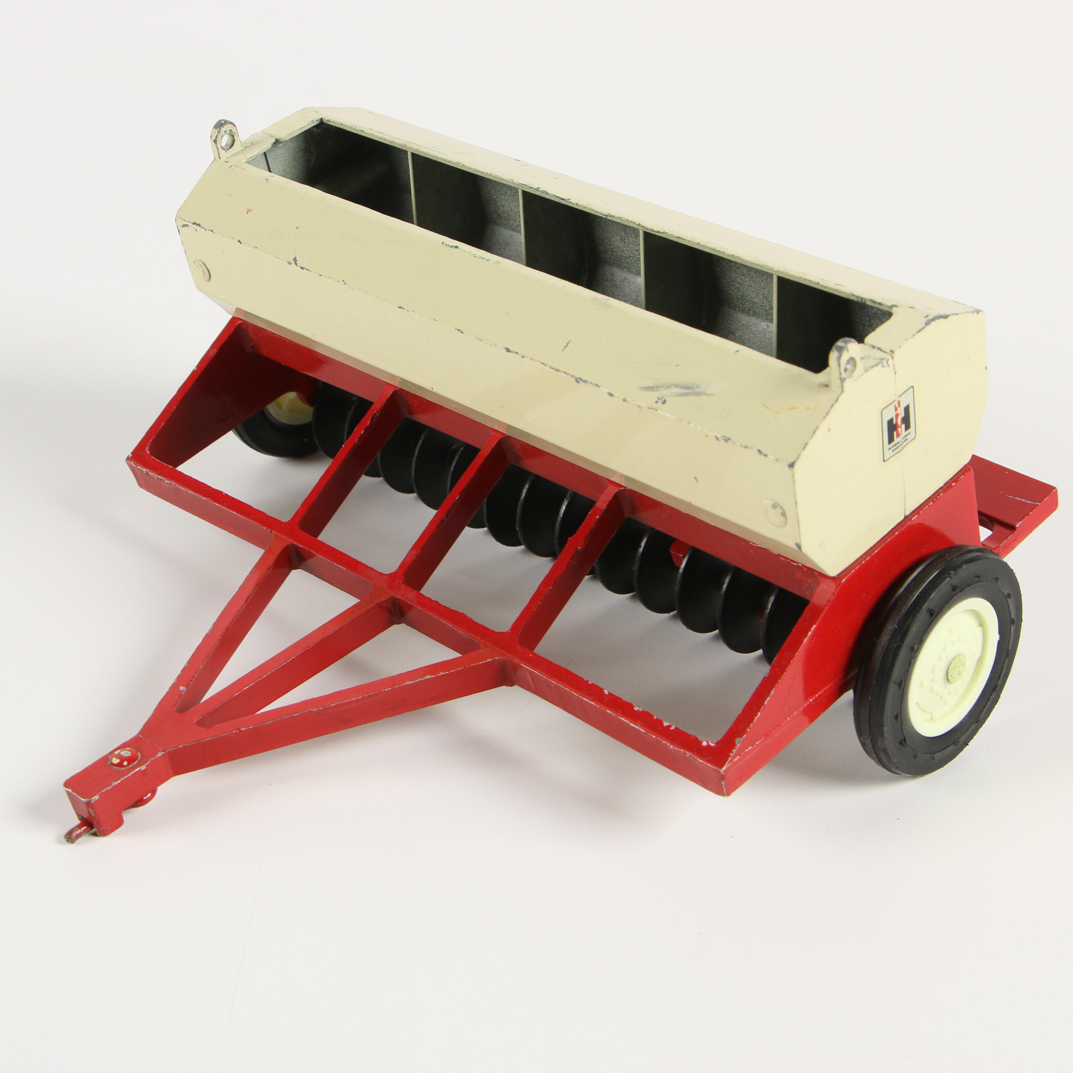 ERTL Co. Die-Cast Metal International Harvester Toy Tractors and Farm Implements