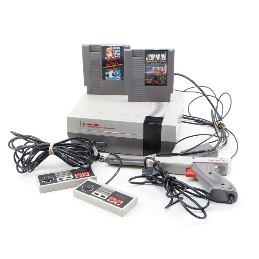 Nintendo Entertainment System with Controllers and Games