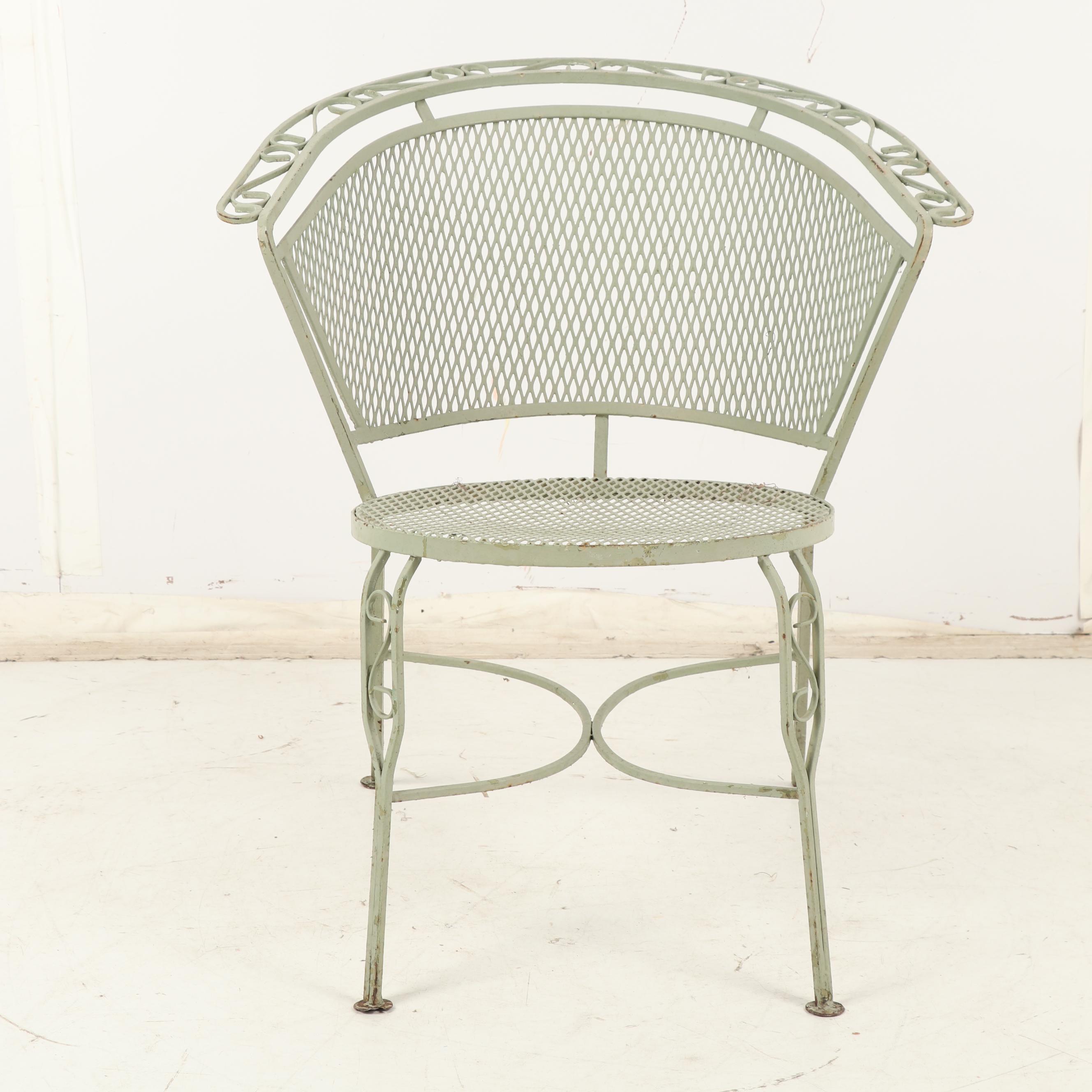 Four Green Metal Patio Chairs