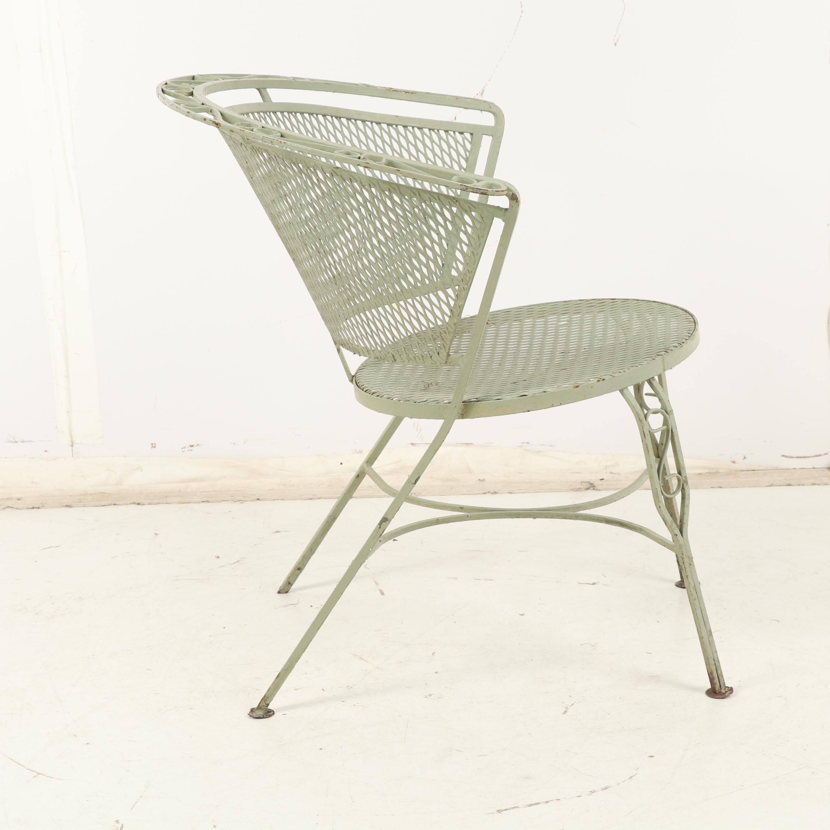 Four Green Metal Patio Chairs