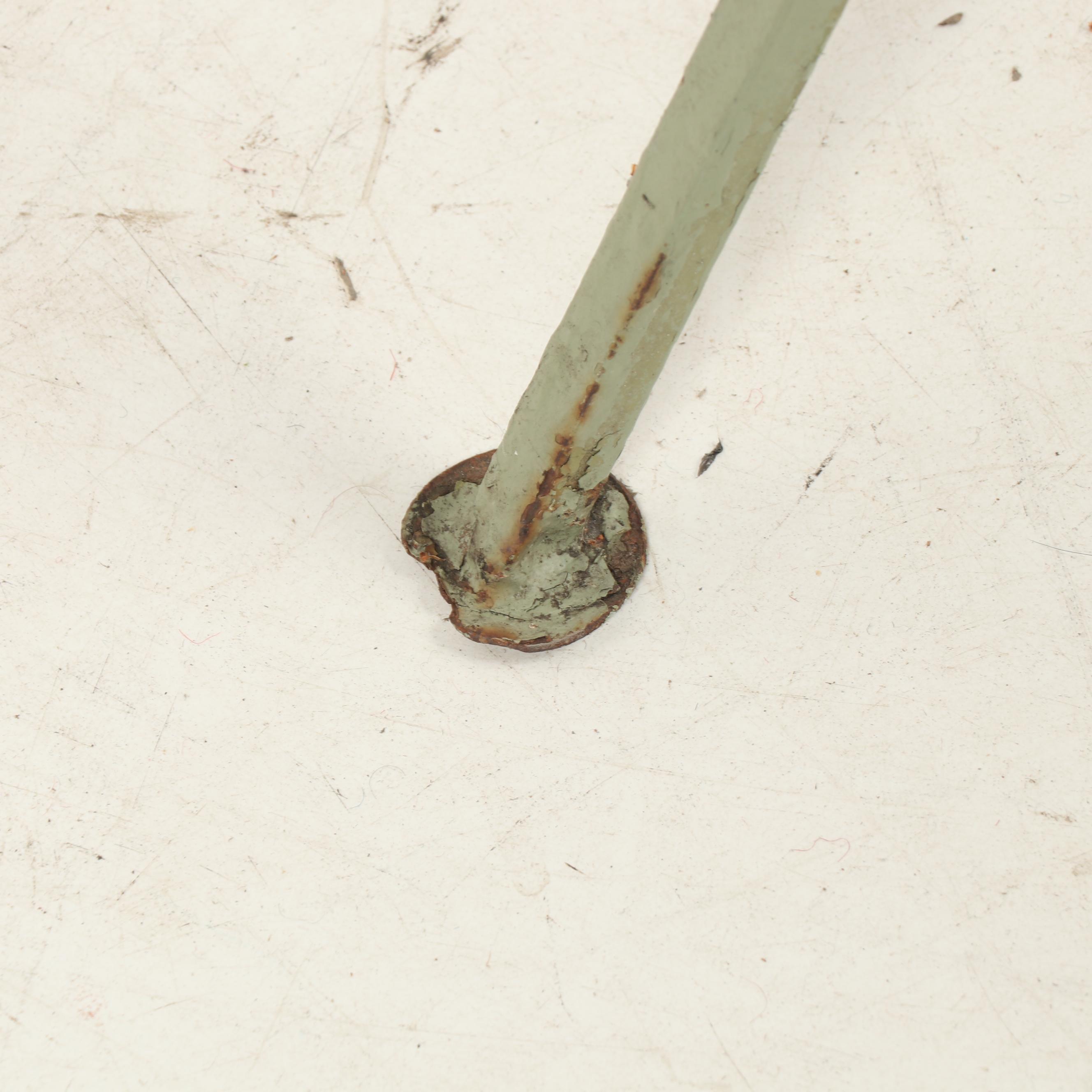 Four Green Metal Patio Chairs