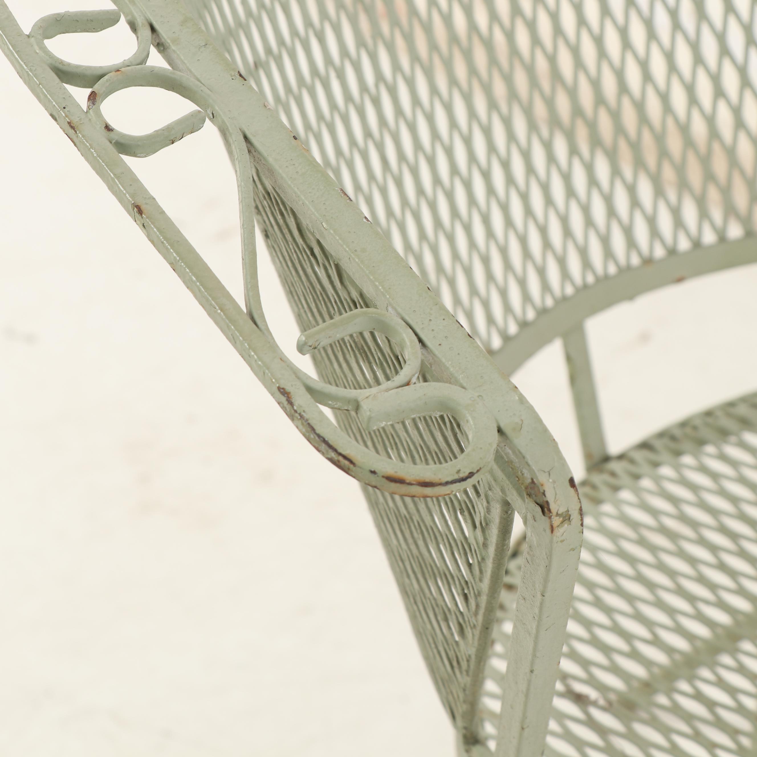 Four Green Metal Patio Chairs