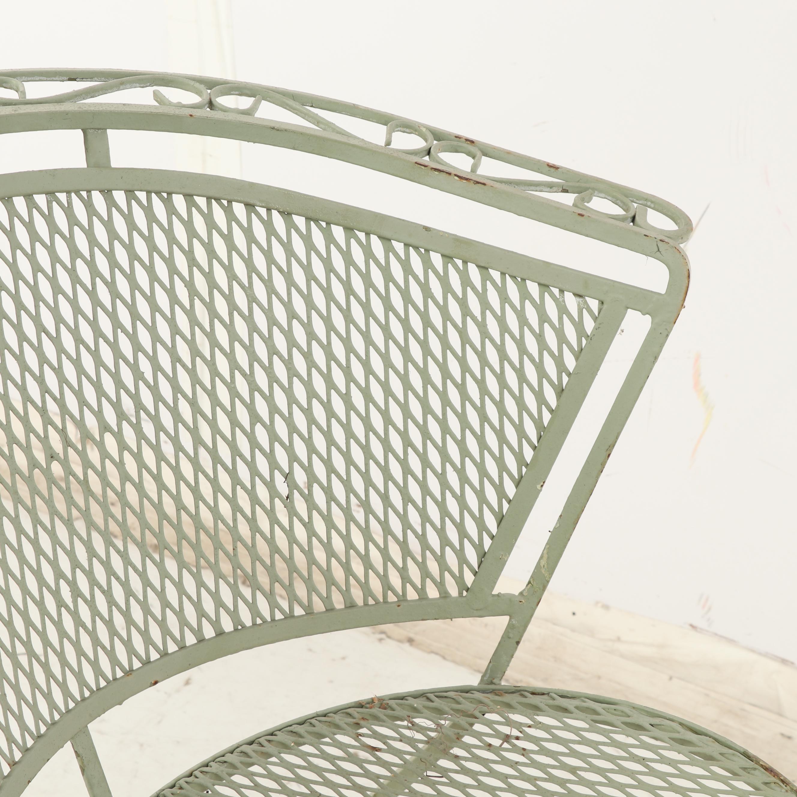 Four Green Metal Patio Chairs