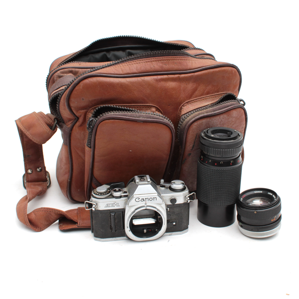 Canon AE-1 35mm SLR Camera, Super Albinar Lens, and Leather Camera Bag