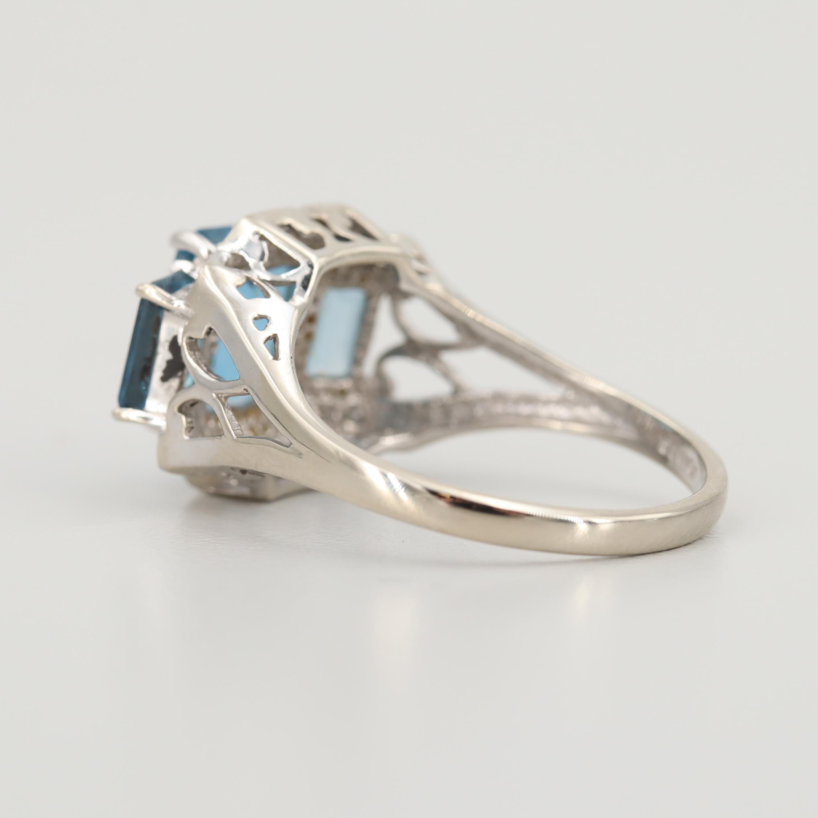 10K White Gold Blue Topaz and Diamond Ring