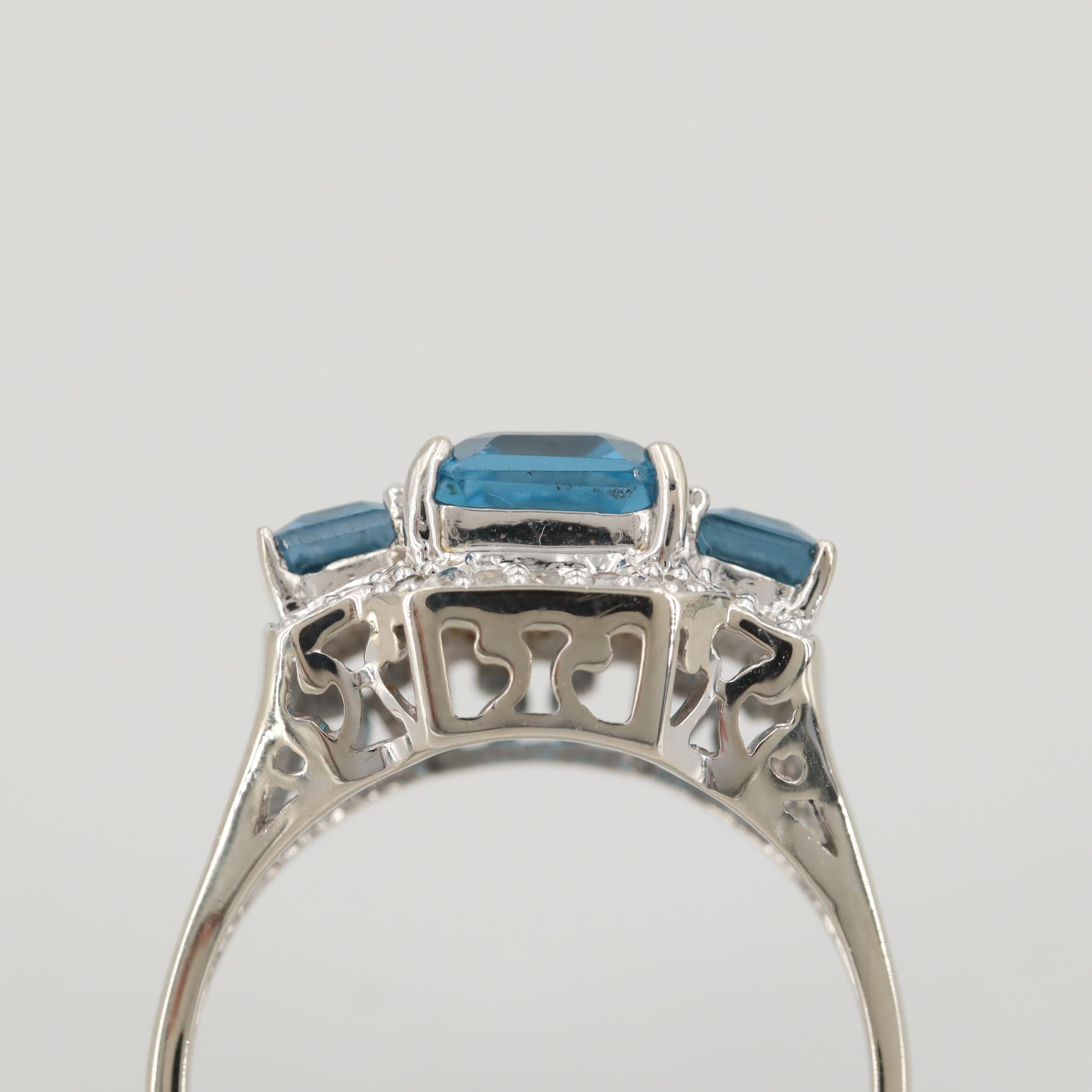 10K White Gold Blue Topaz and Diamond Ring