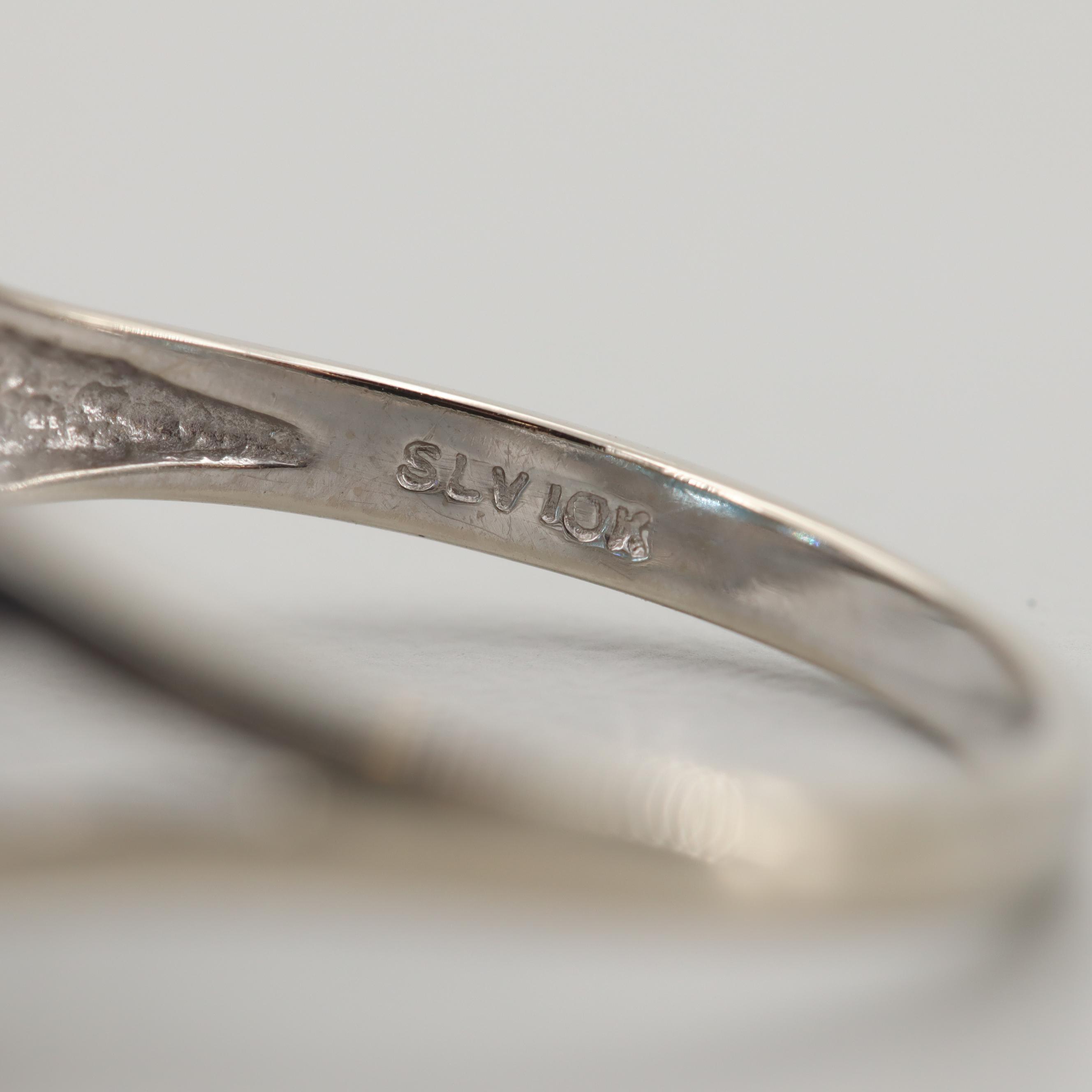 10K White Gold Blue Topaz and Diamond Ring