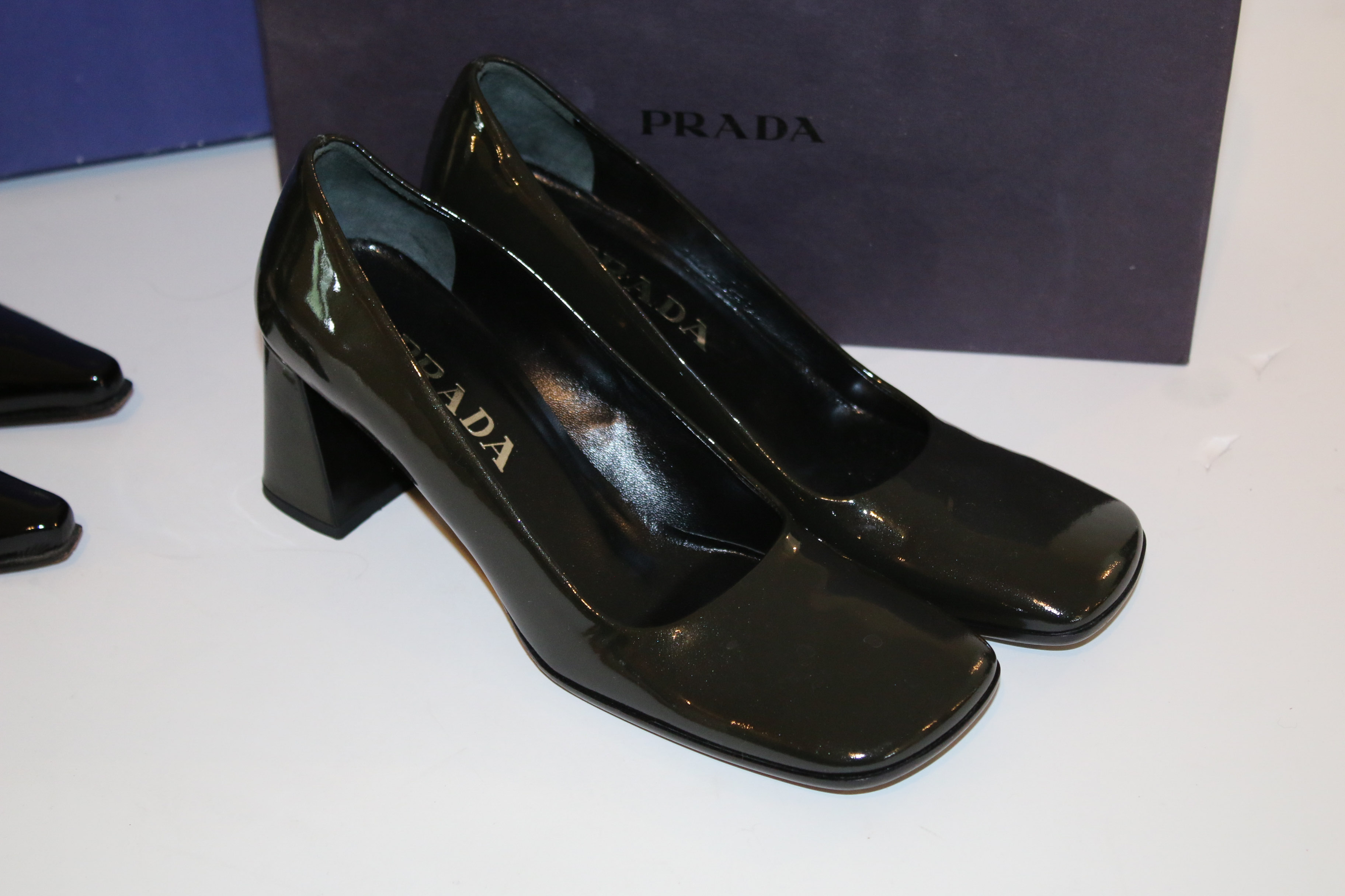 Prada Black Patent Square Toe Pumps and Stuart Weitzman High-Heels