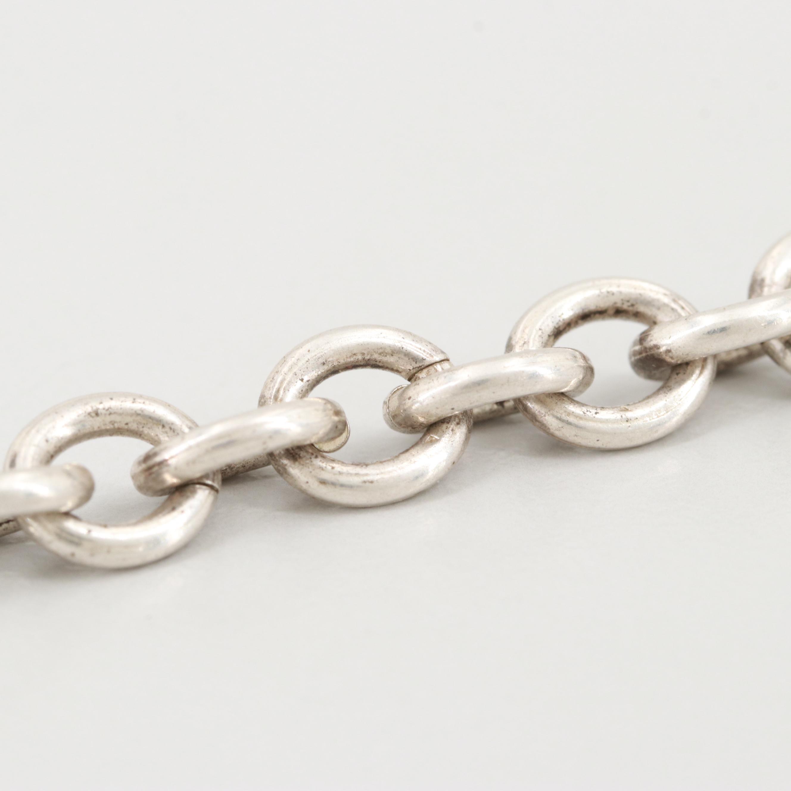 Sterling Silver Link Bracelet with a Heart Pendant