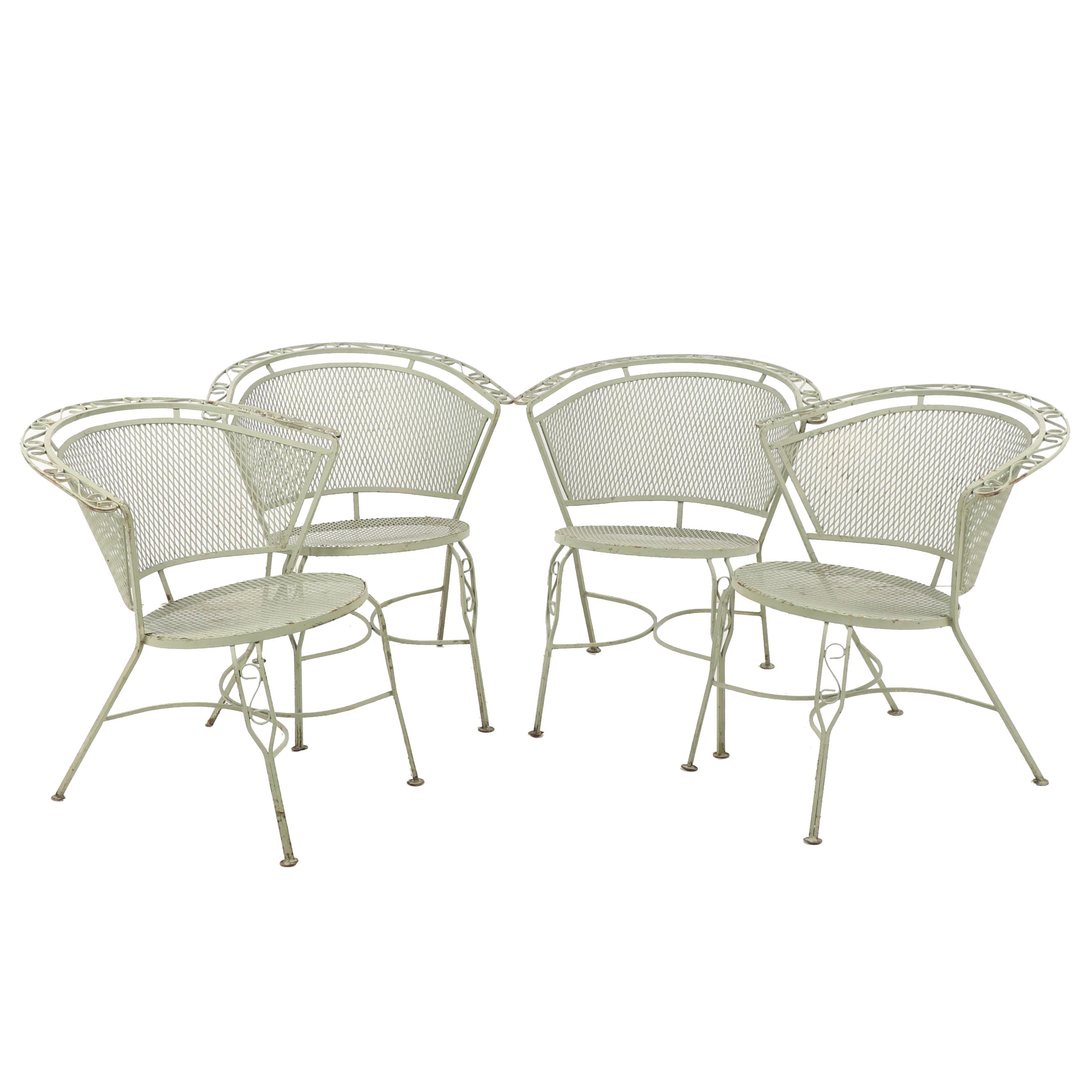 Four Green Metal Patio Chairs