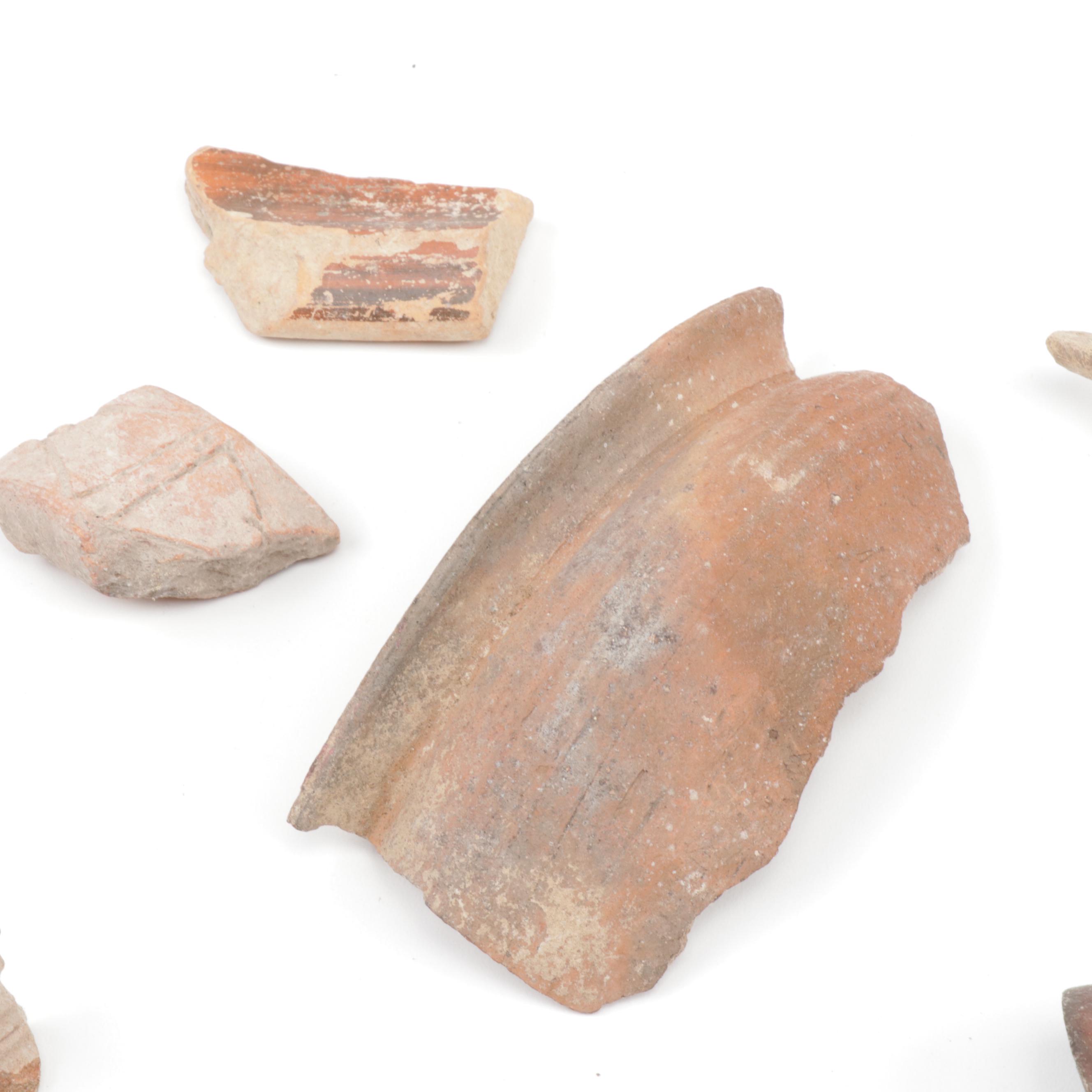 Antique Greco-Roman-Style Potsherds and Pipe Heads