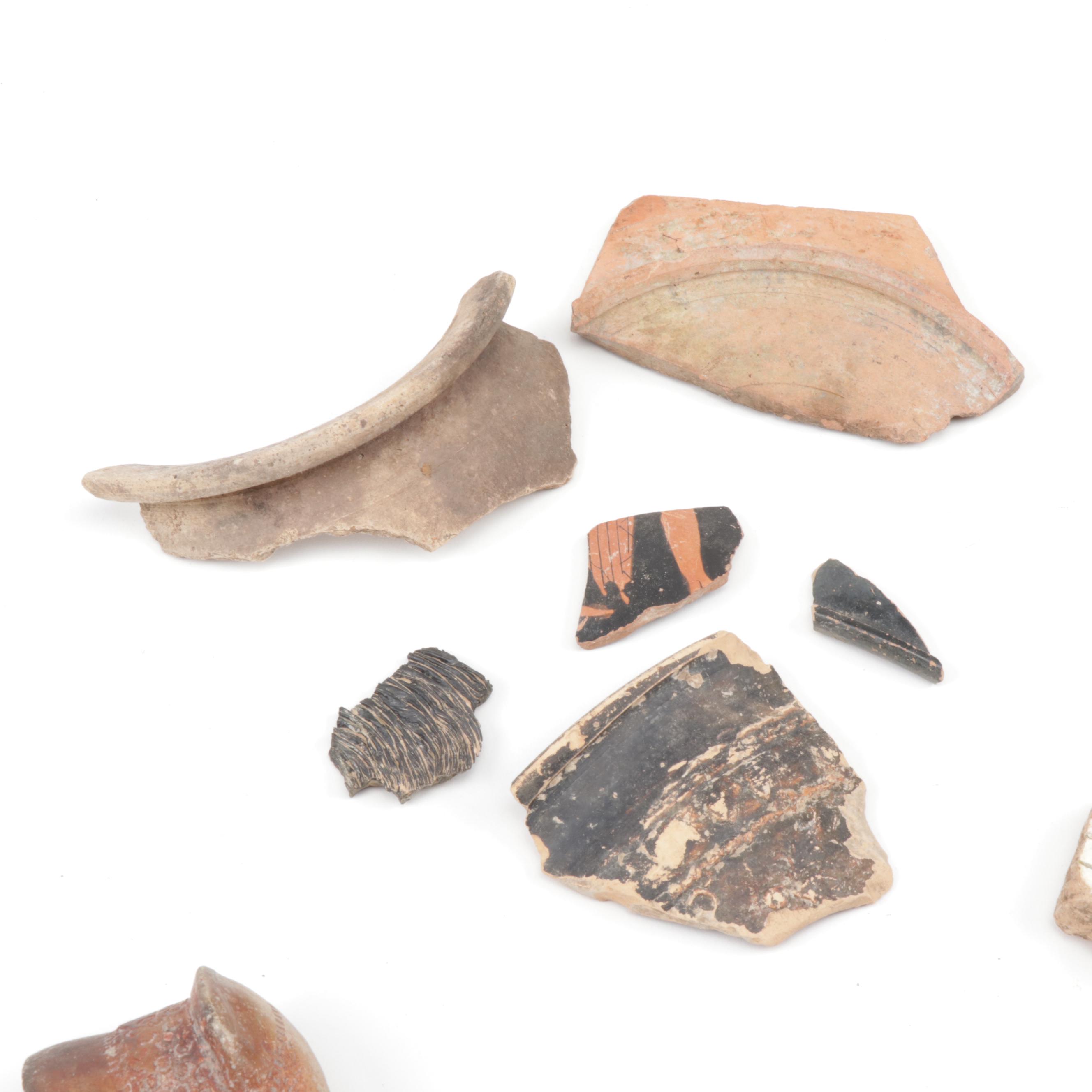 Antique Greco-Roman-Style Potsherds and Pipe Heads