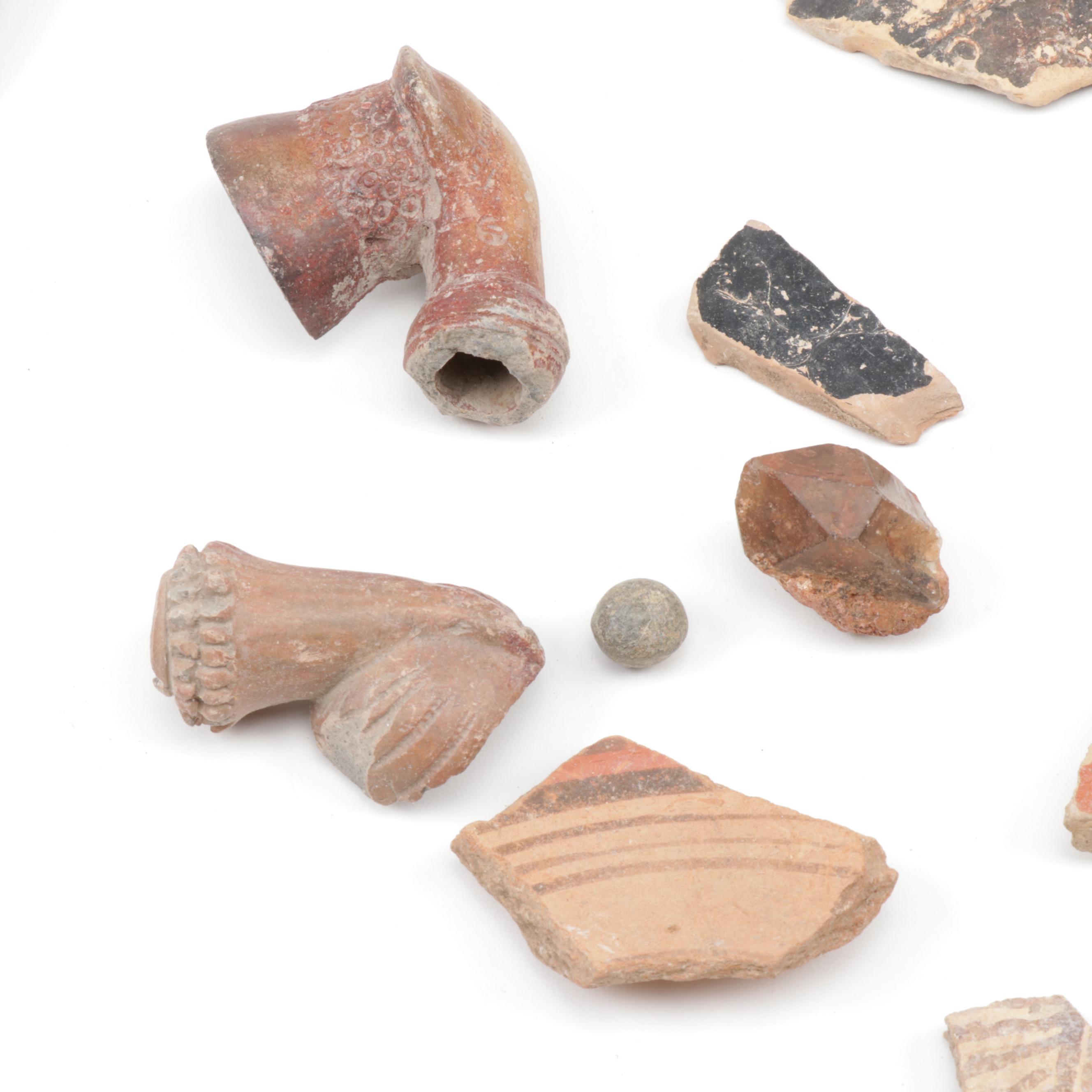 Antique Greco-Roman-Style Potsherds and Pipe Heads