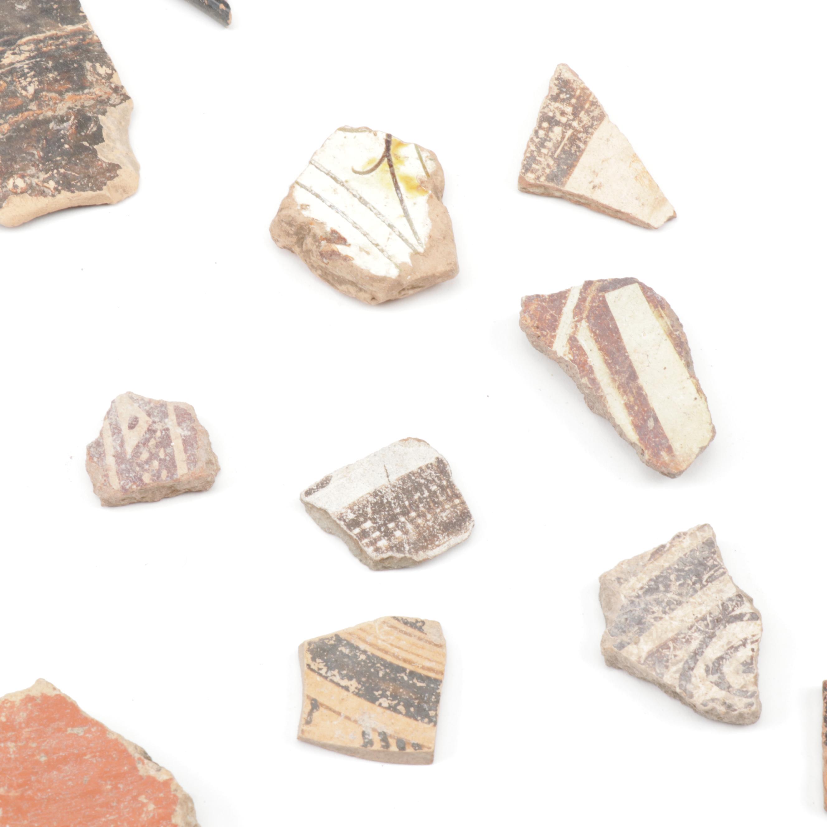 Antique Greco-Roman-Style Potsherds and Pipe Heads