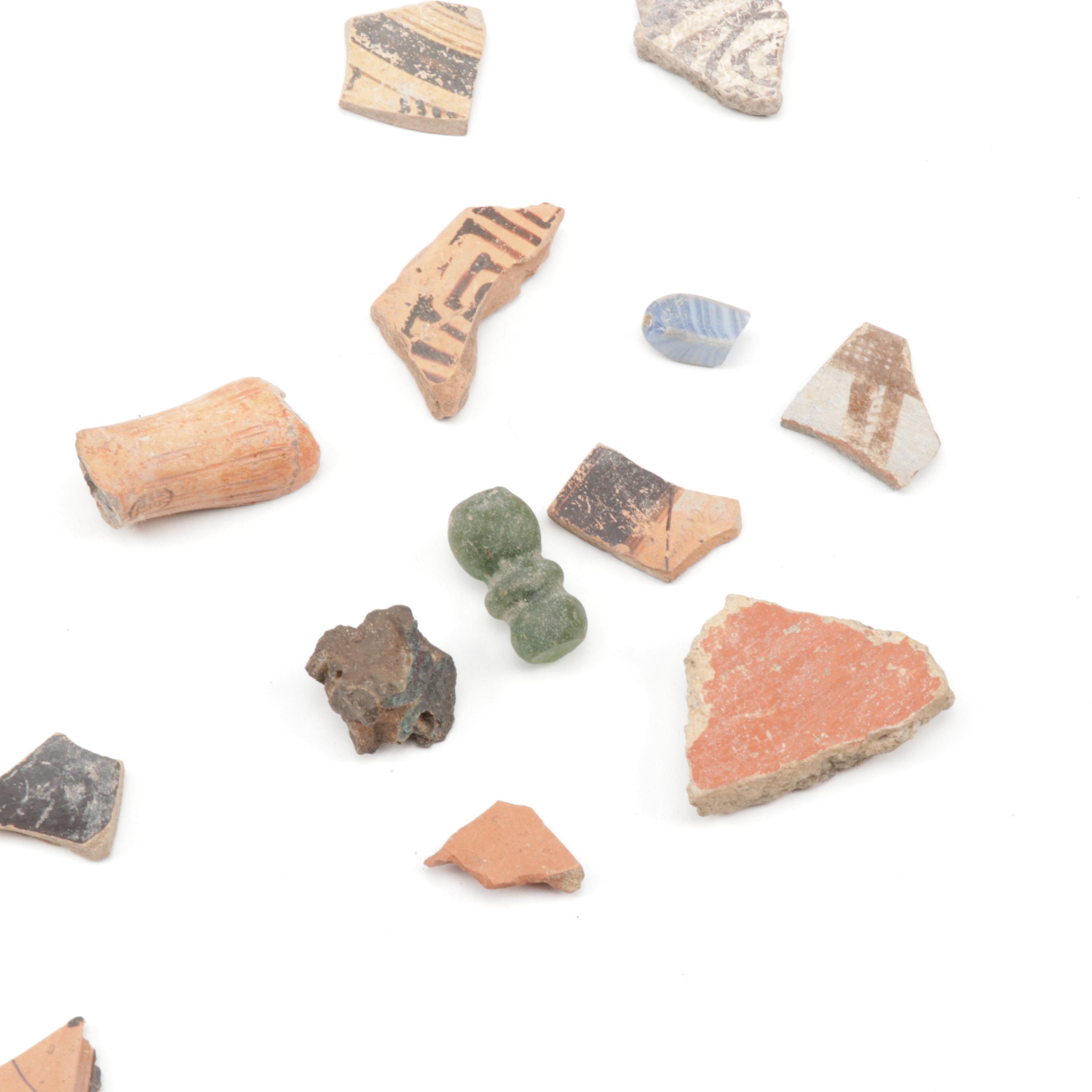 Antique Greco-Roman-Style Potsherds and Pipe Heads