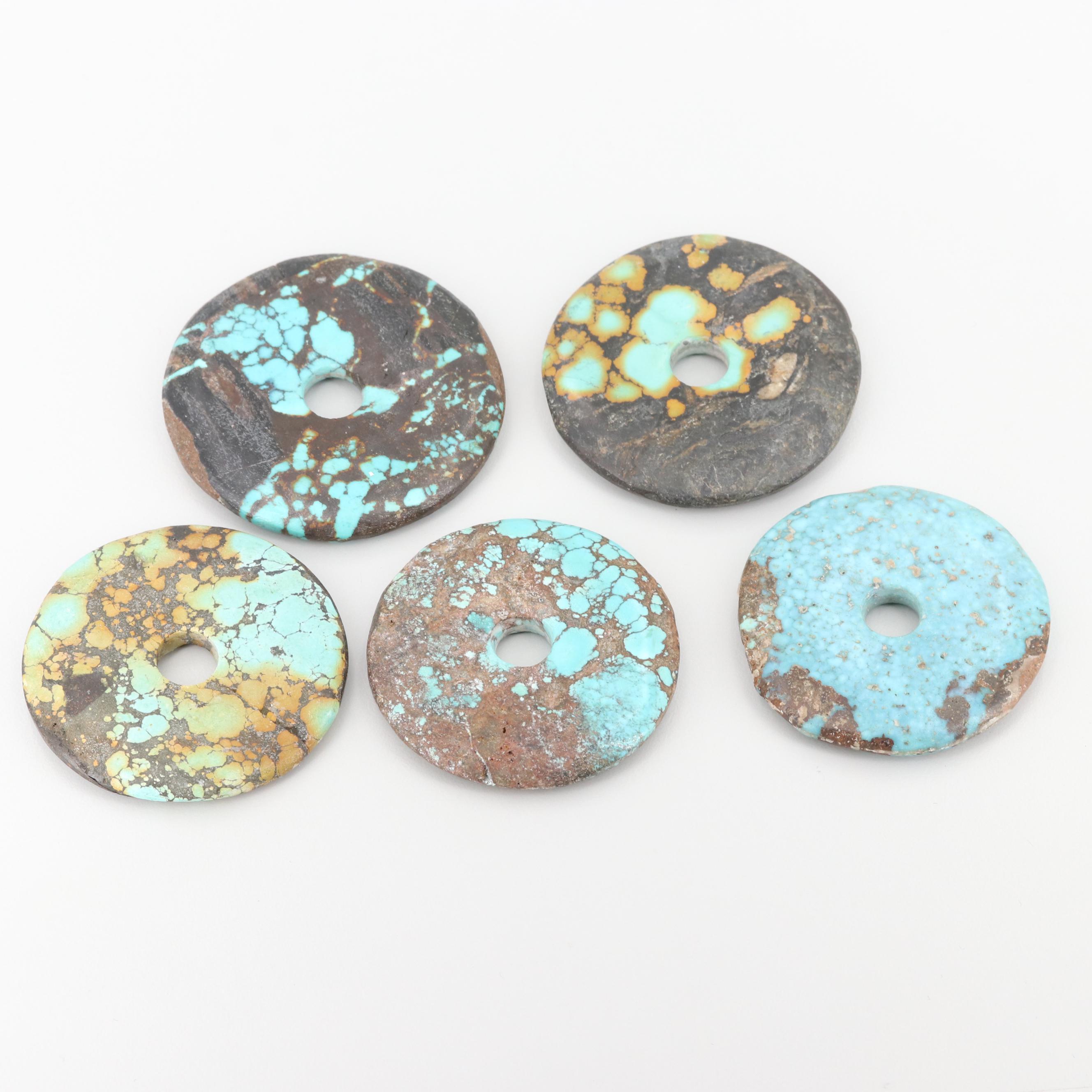 Loose Turquoise Carvings Including Discs and Figural Bead