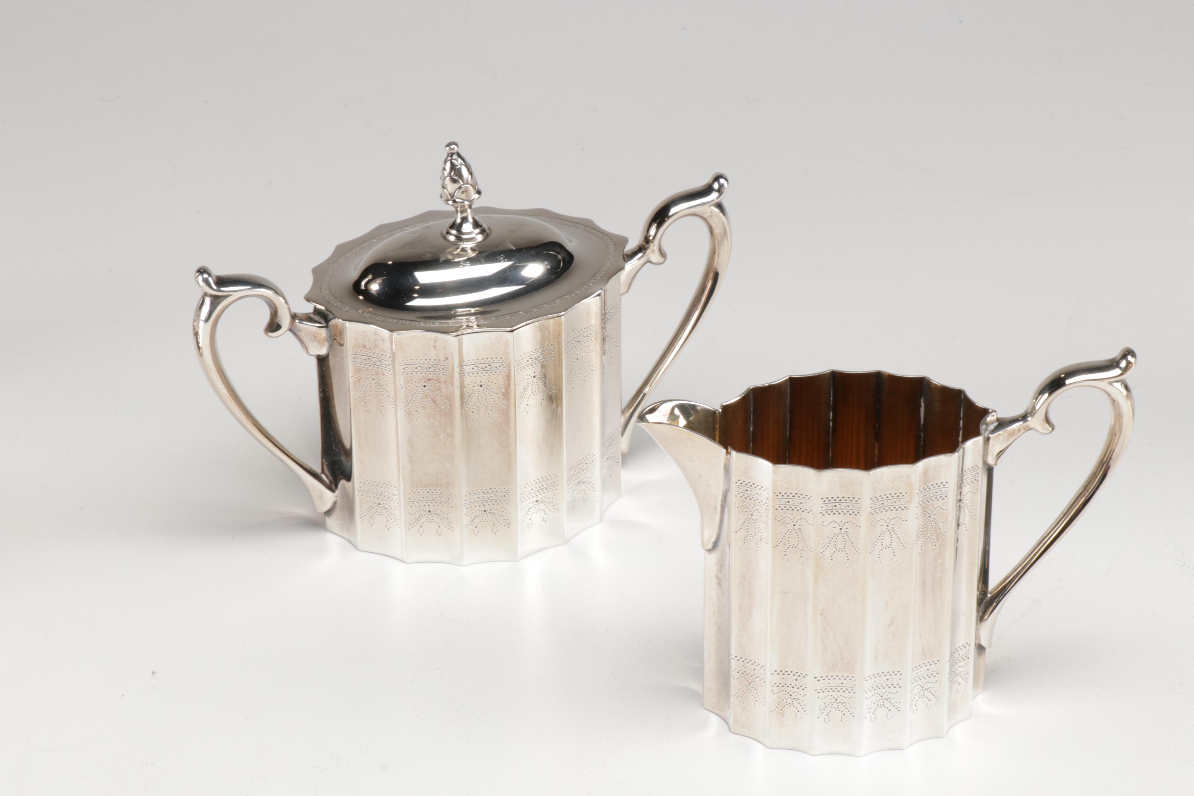 Lunt Silver Plate "Paul Revere" Tea Service and Candlesticks