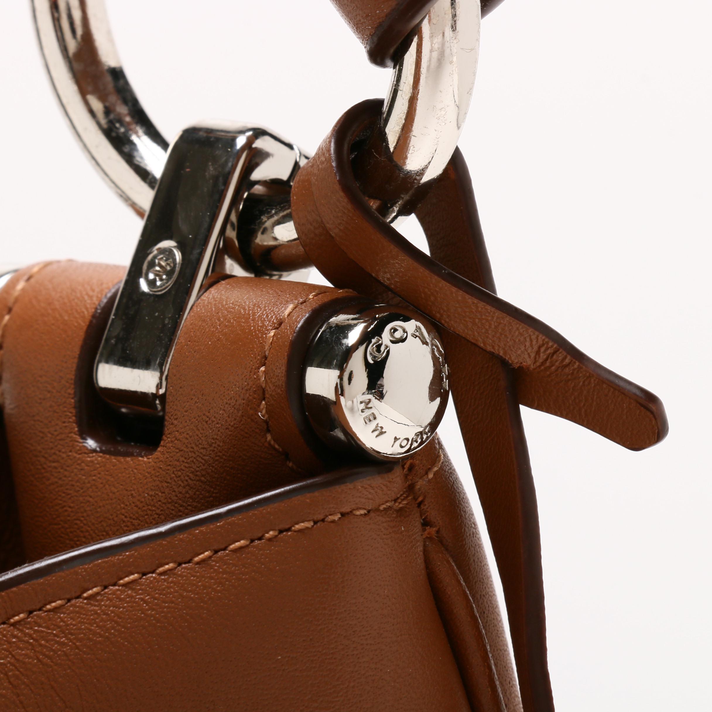 Coach New York Nomad Hobo Bag in Saddle Glove Tan Leather