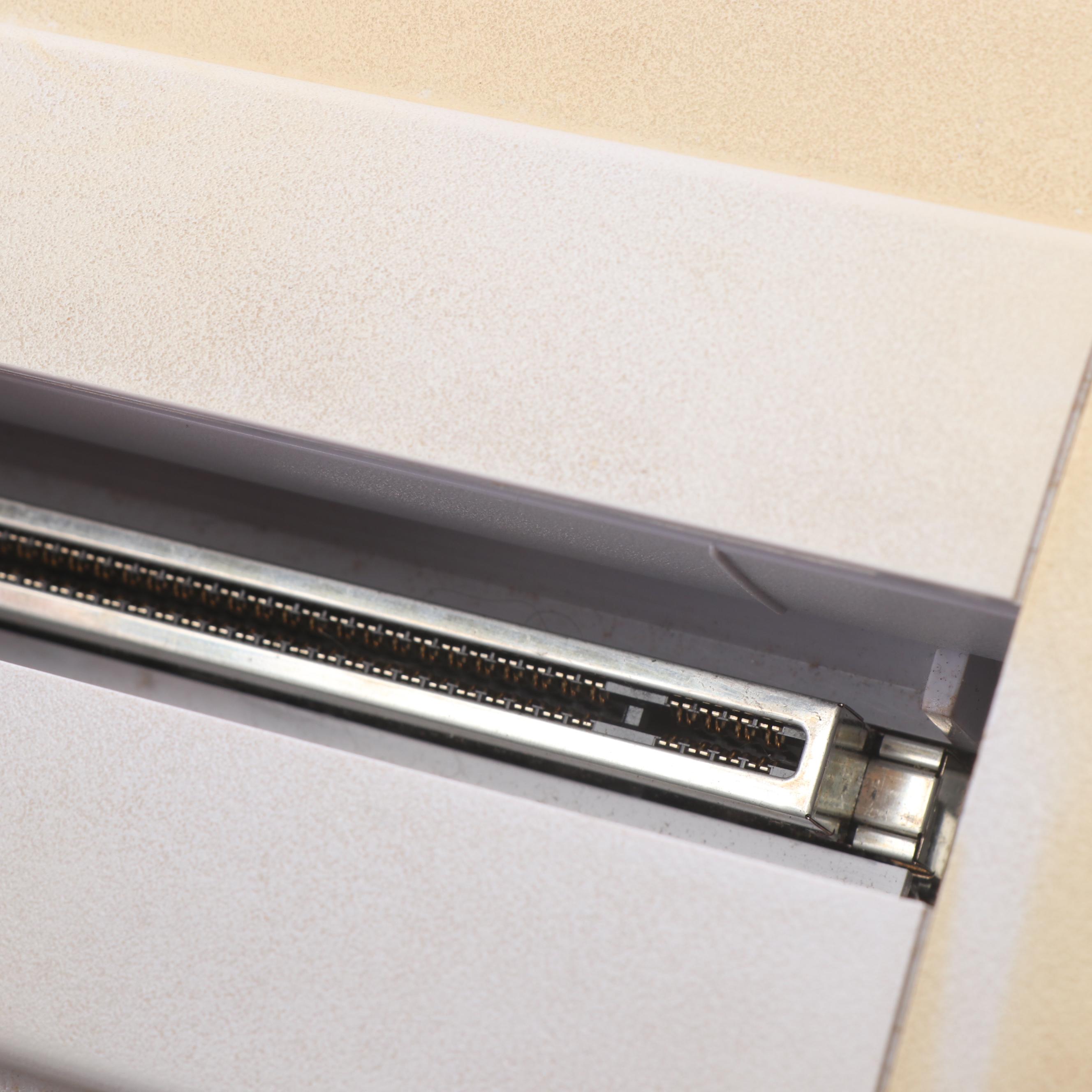 Super Nintendo Gaming Console Model SNS-001 and Game Cartridges