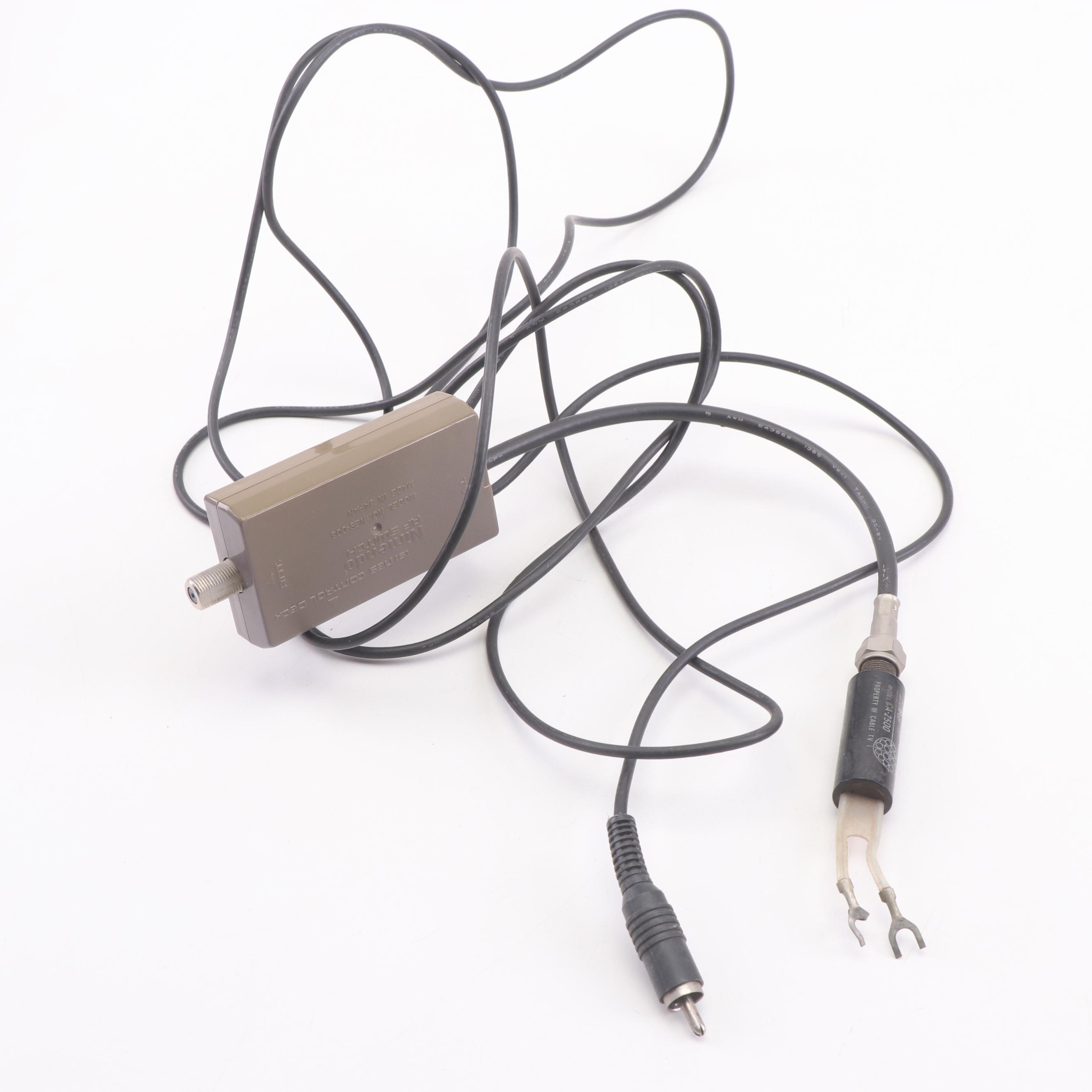 Super Nintendo Gaming Console Model SNS-001 and Game Cartridges