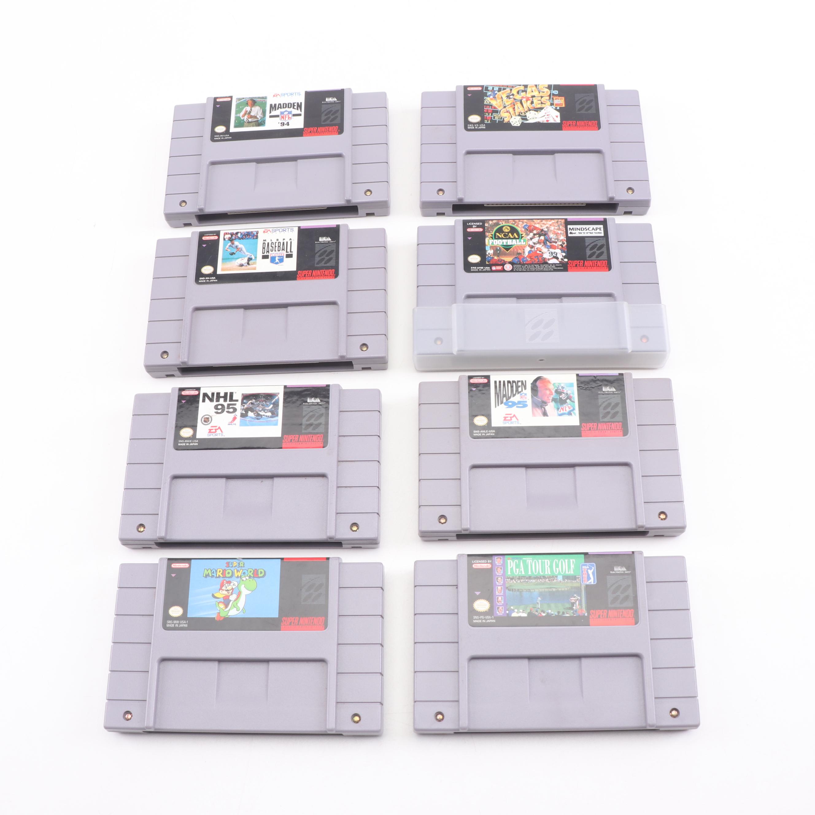 Super Nintendo Gaming Console Model SNS-001 and Game Cartridges