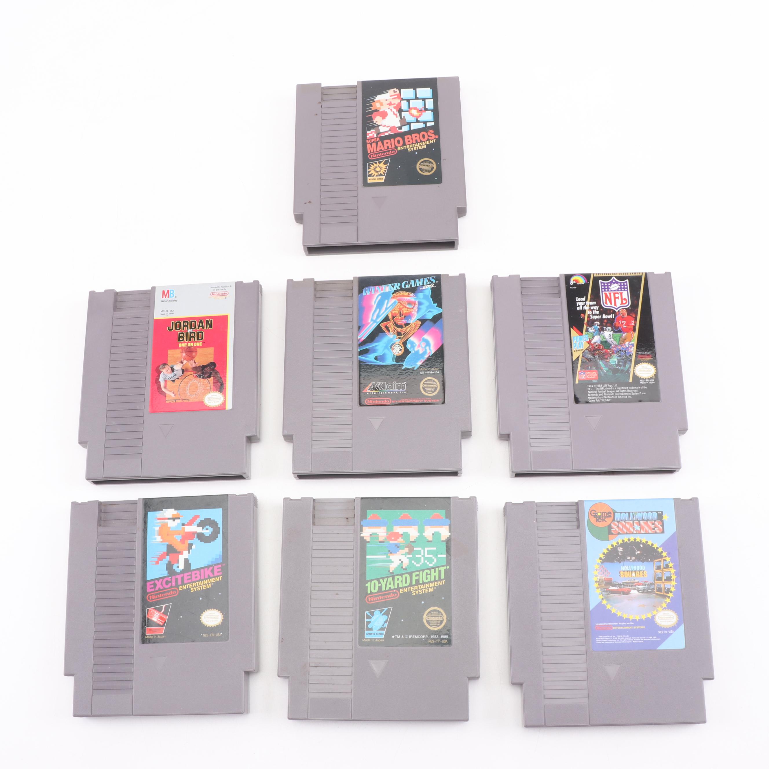 Super Nintendo Gaming Console Model SNS-001 and Game Cartridges