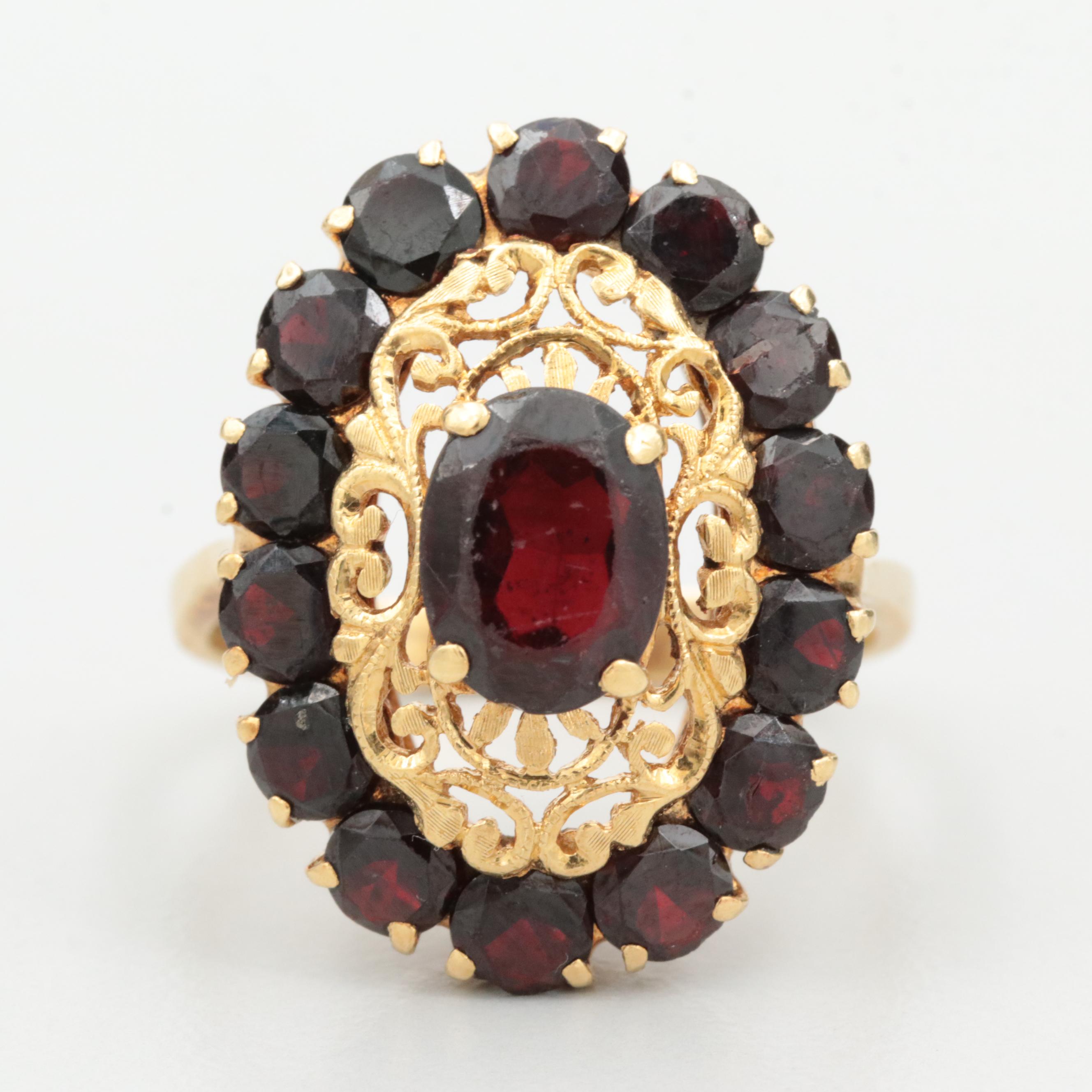 Vintage Italian 18K Yellow Gold Garnet Ring with Openwork Detail