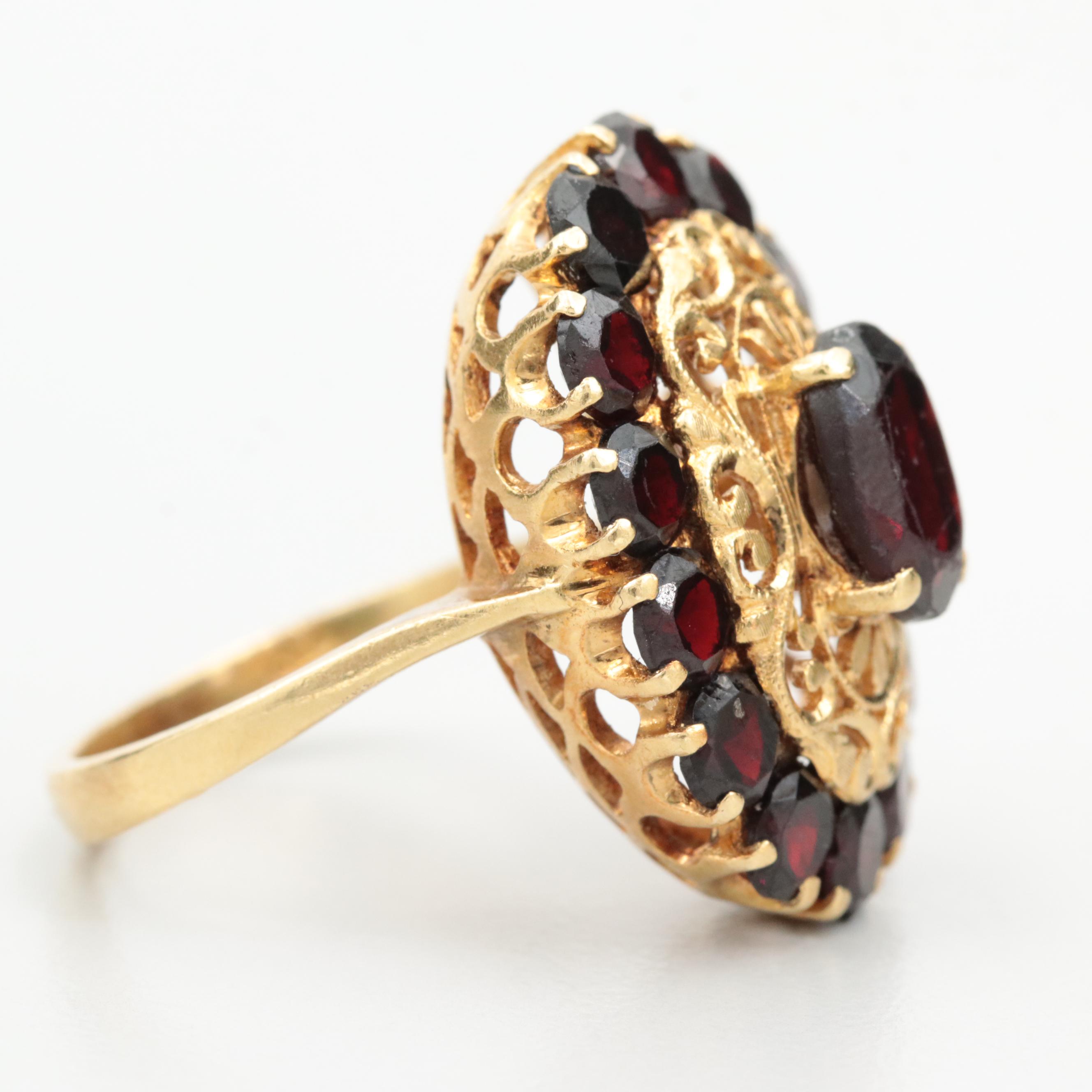 Vintage Italian 18K Yellow Gold Garnet Ring with Openwork Detail