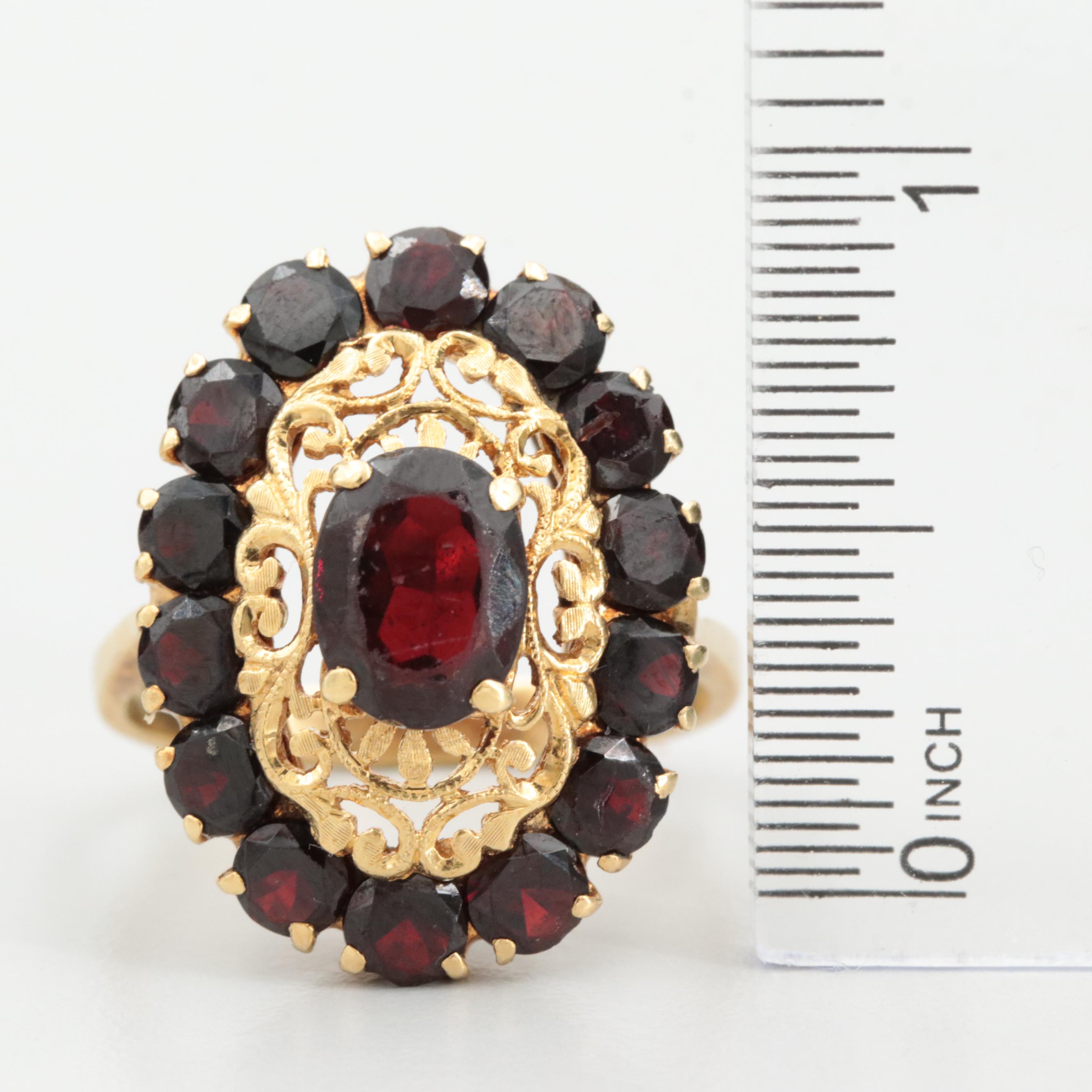Vintage Italian 18K Yellow Gold Garnet Ring with Openwork Detail