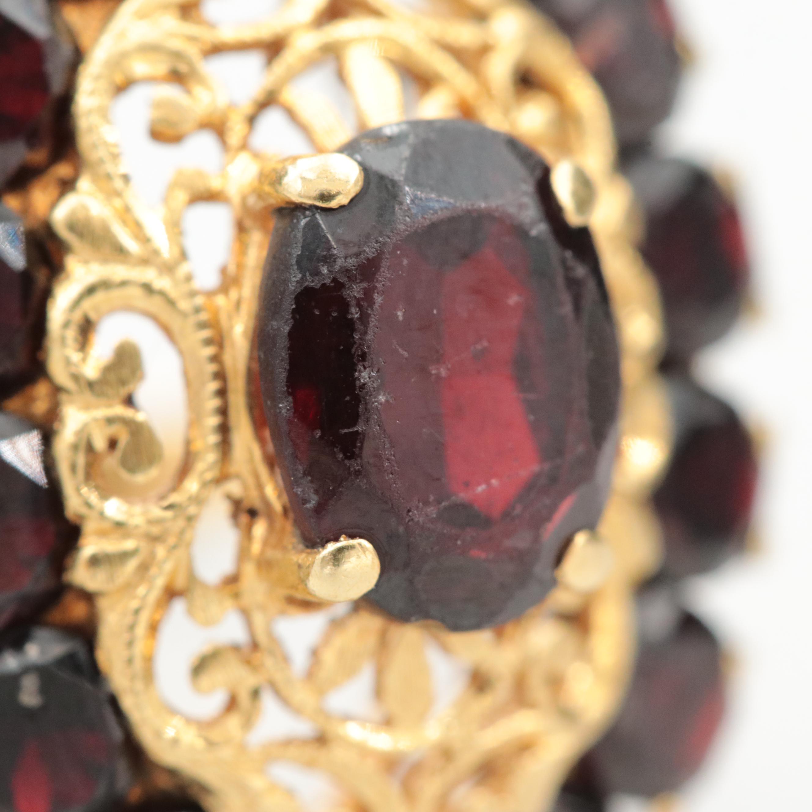 Vintage Italian 18K Yellow Gold Garnet Ring with Openwork Detail