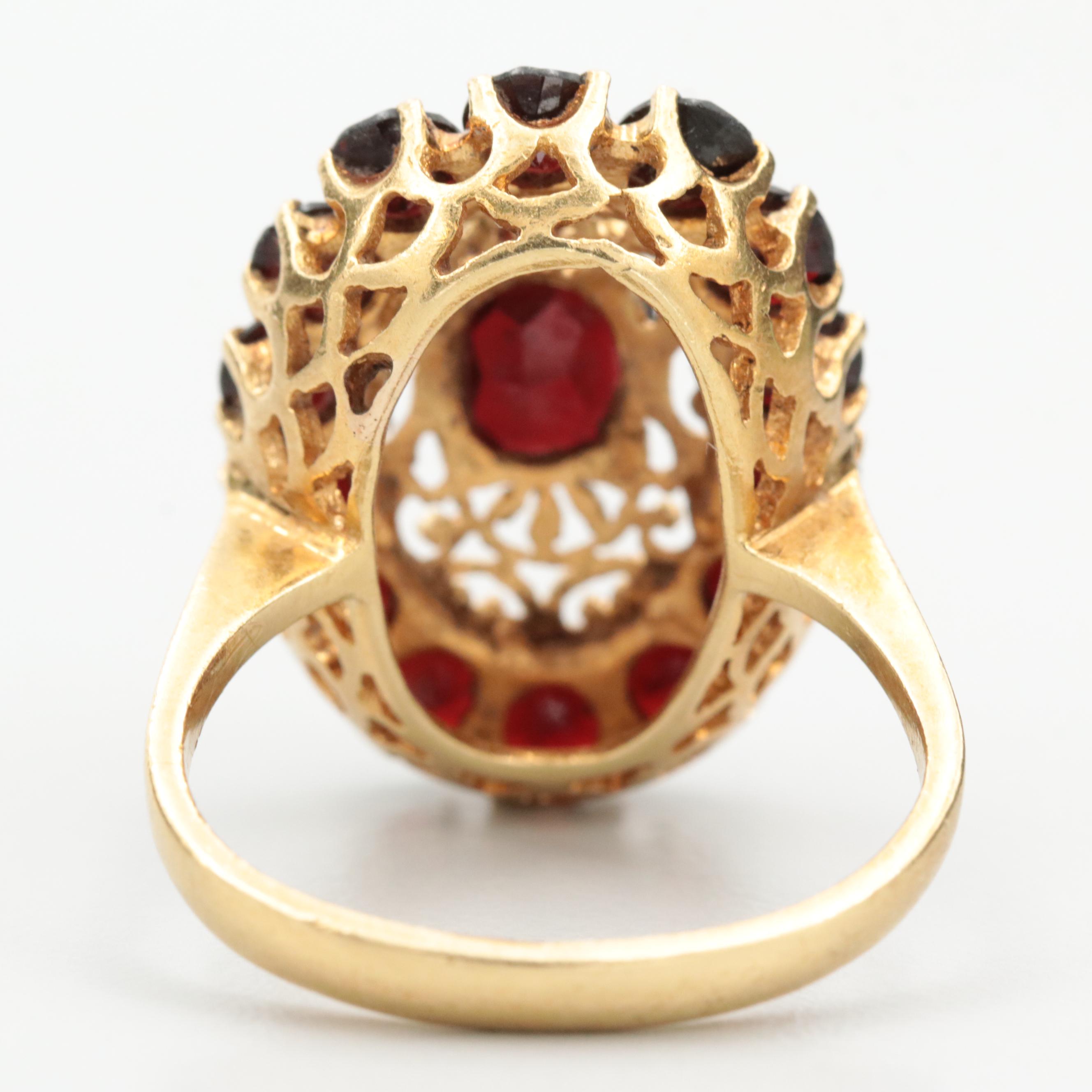 Vintage Italian 18K Yellow Gold Garnet Ring with Openwork Detail